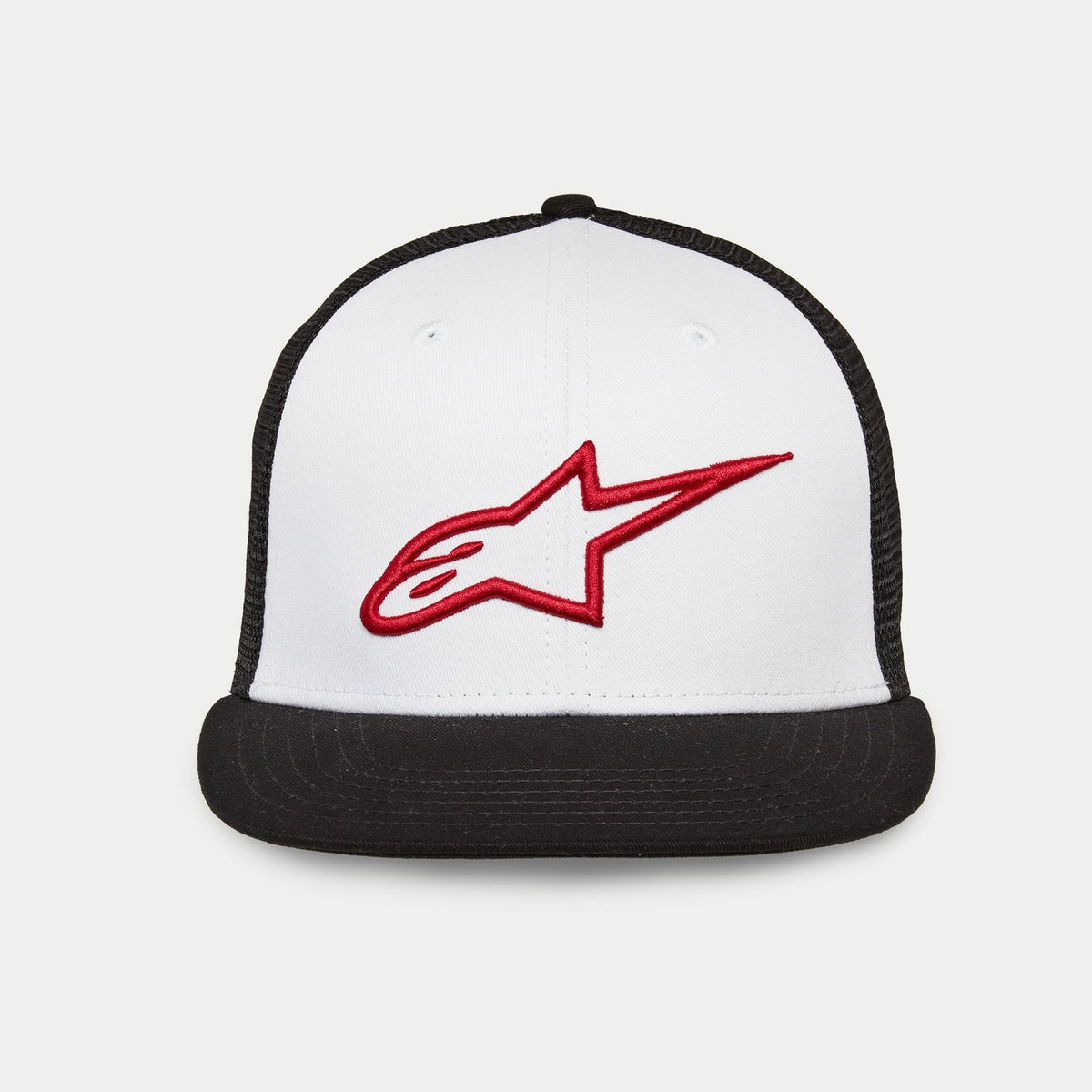 Alpinestars Corp Trucker Hat, flat bill trucker with structured crown, white front panel with black mesh back and black bill, red 3D embroidered Alpinestars logo, casual motorsport headwear