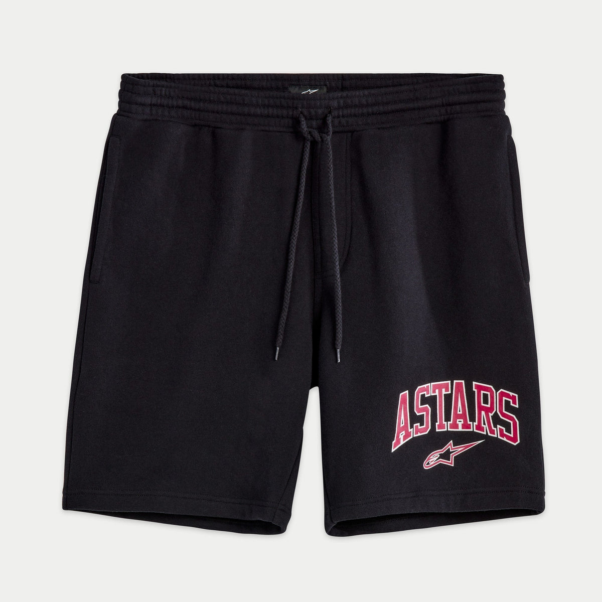 Alpinestars Dunker Short, short de entrenamiento de forro polar en color negro, con logotipo ASTARS en rojo y blanco en la pierna, cintura elástica con cordón ajustable y bolsillos laterales, ropa deportiva casual para hombre