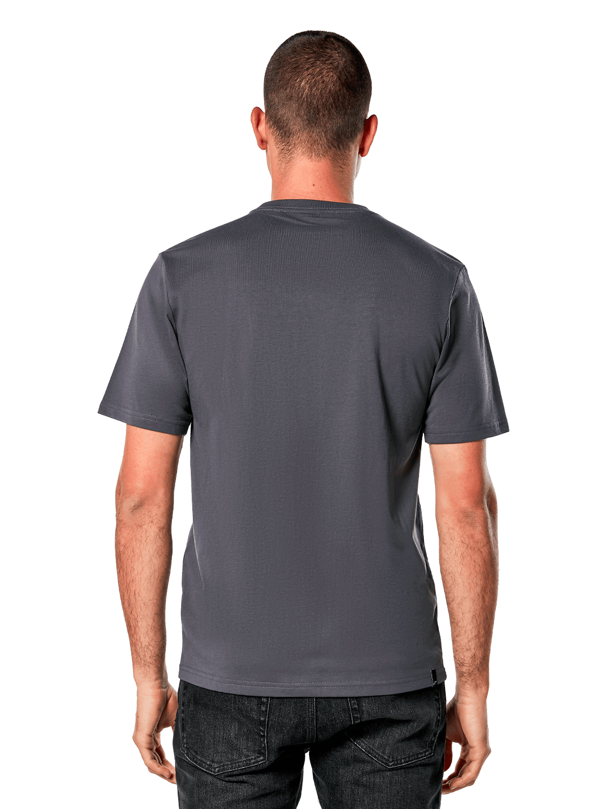 Alpinestars Galun CSF Tee, camiseta de manga corta, color gris carbón, vista trasera lisa, combinada con jeans negros, estilo motorsport streetwear casual