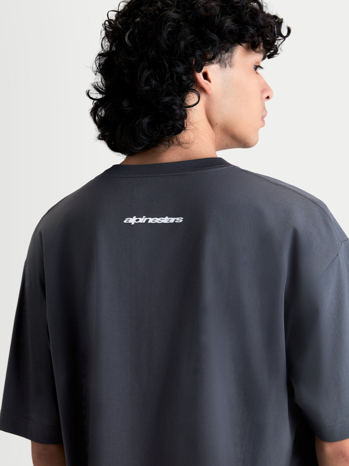 Alpinestars Mandate Oversized CSF Tee, Men's and Women's Casual Sportswear, Gray, featuring a white puff-print Alpinestars wordmark graphic on the back, soft cotton-poly blend, relaxed oversized fit.