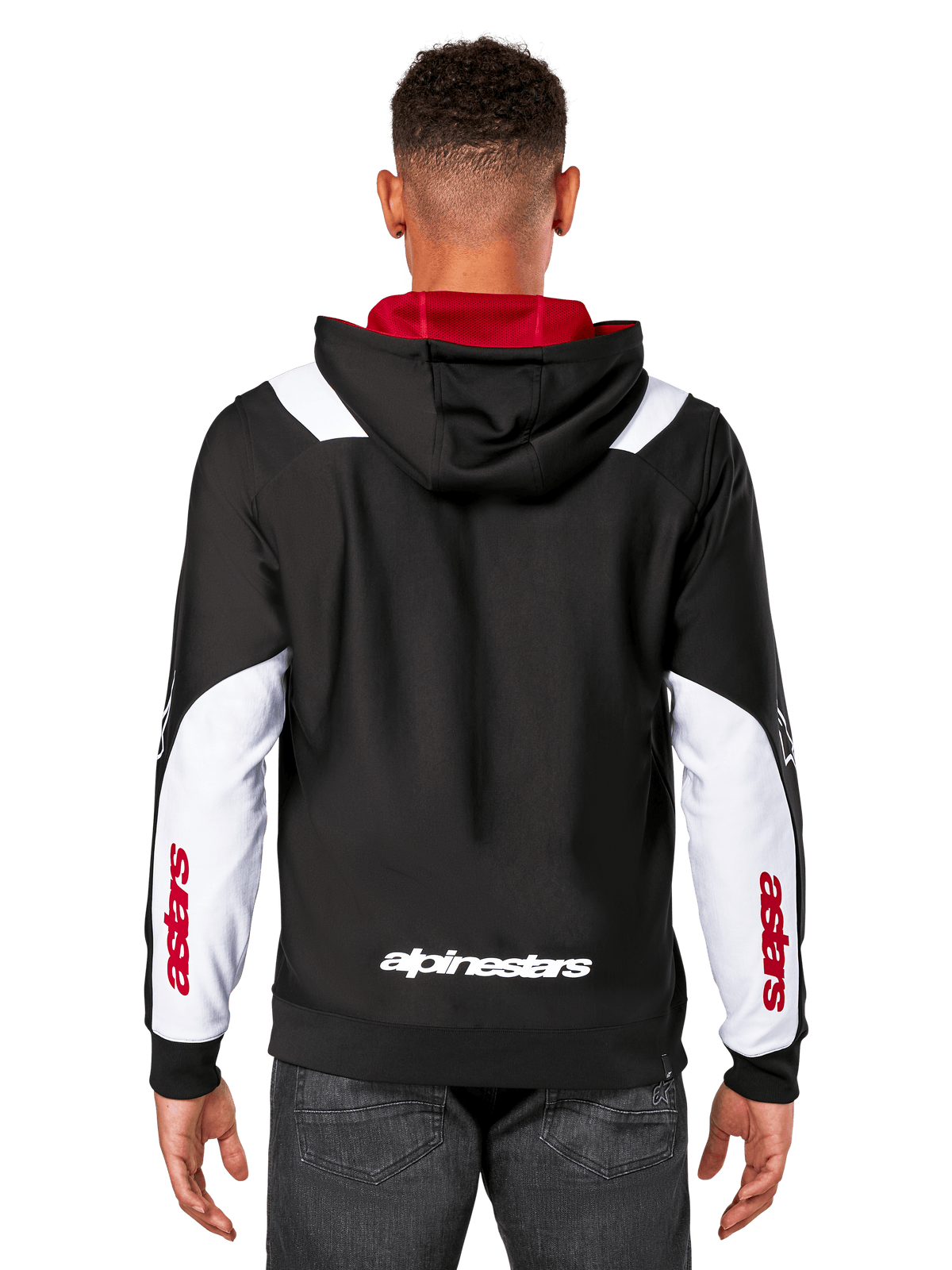 Alpinestars Sessions V3 Hoodie, vista trasera, negra con paneles blancos en las mangas y forro rojo en la capucha, con logotipo blanco en la espalda y marca roja en las mangas, ropa urbana casual inspirada en el automovilismo