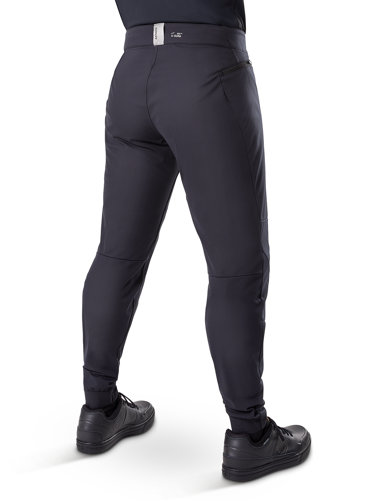 Alpinestars A-Dura Thermal Pant, Mountain Bike Pants, Black, rear view showing zippered pockets and branding on the waistband, tapered fit for cold-weather cycling