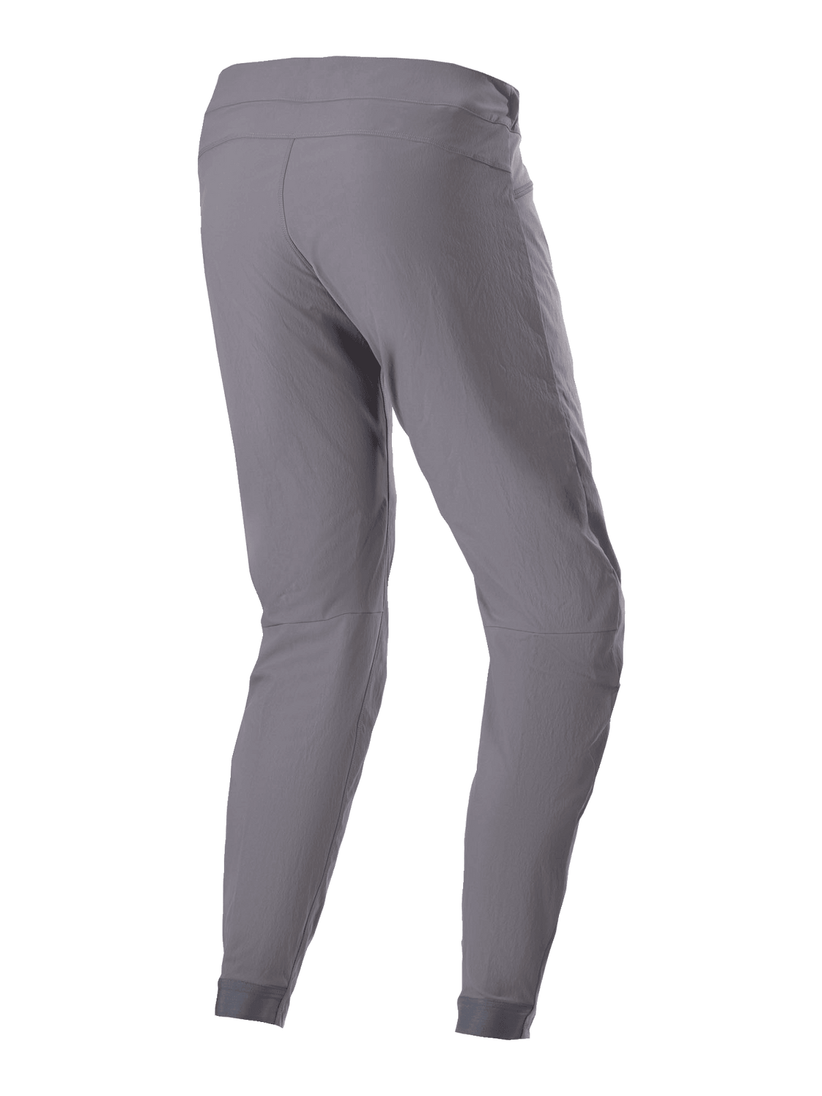Pantalones Alpinestars A-Dura, pantalones de ciclismo MTB, gris oscuro, vista trasera de tres cuartos, con tejido elástico bidireccional resistente, puños elásticos y ajuste ergonómico diseñado para el rendimiento en senderos de montaña