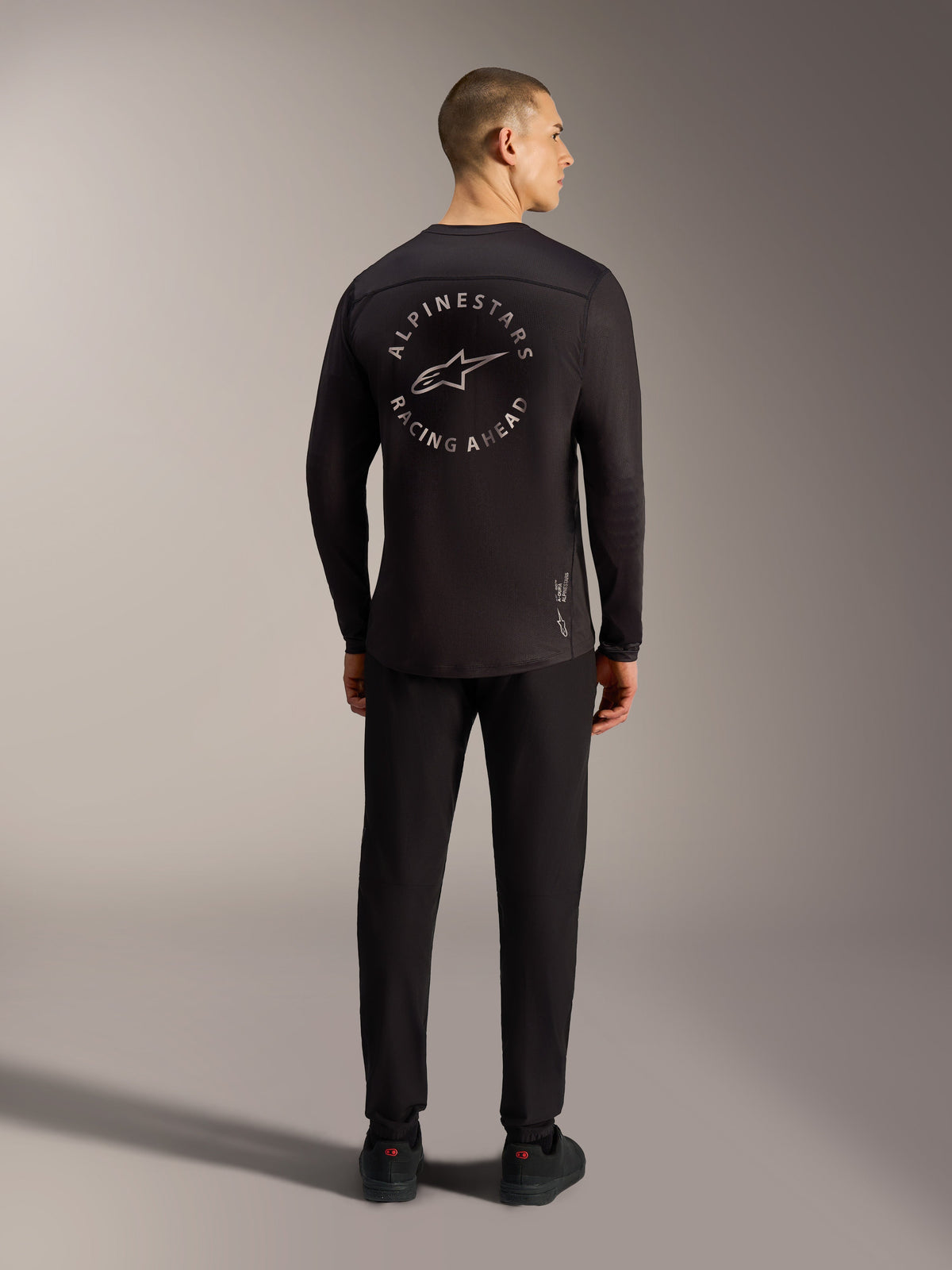 Jersey negro A-Dura Air de manga larga con gráfico circular Racing Ahead y malla jacquard transpirable para MTB.