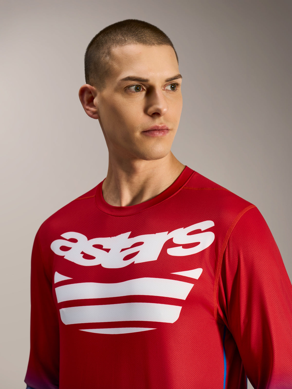 Camiseta A-Dura ASTARS 2.0, jersey de MTB de manga larga rojo y azul con gráficos blancos del logo en el pecho.