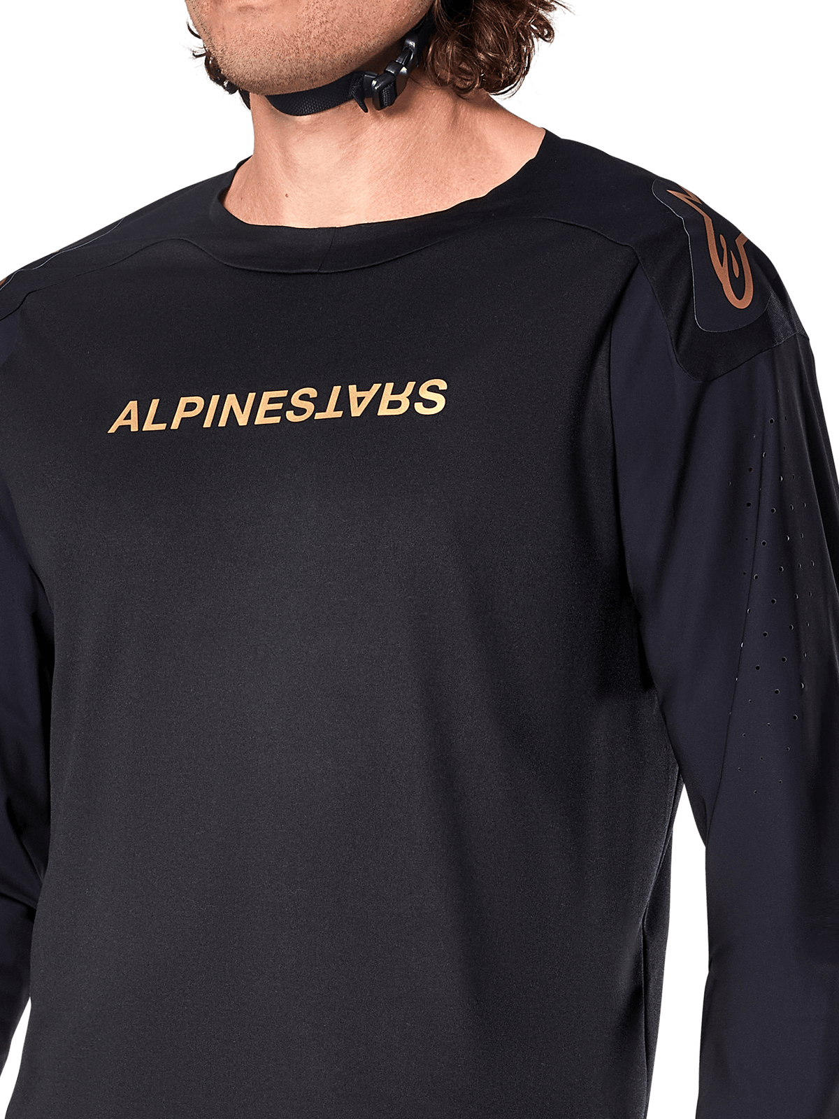 Alpinestars A-Aria Polartec Switch Long Sleeve Jersey, Black, featuring bronze Alpinestars branding on the chest and shoulder, laser perforations on the sleeves for ventilation, technical performance MTB apparel