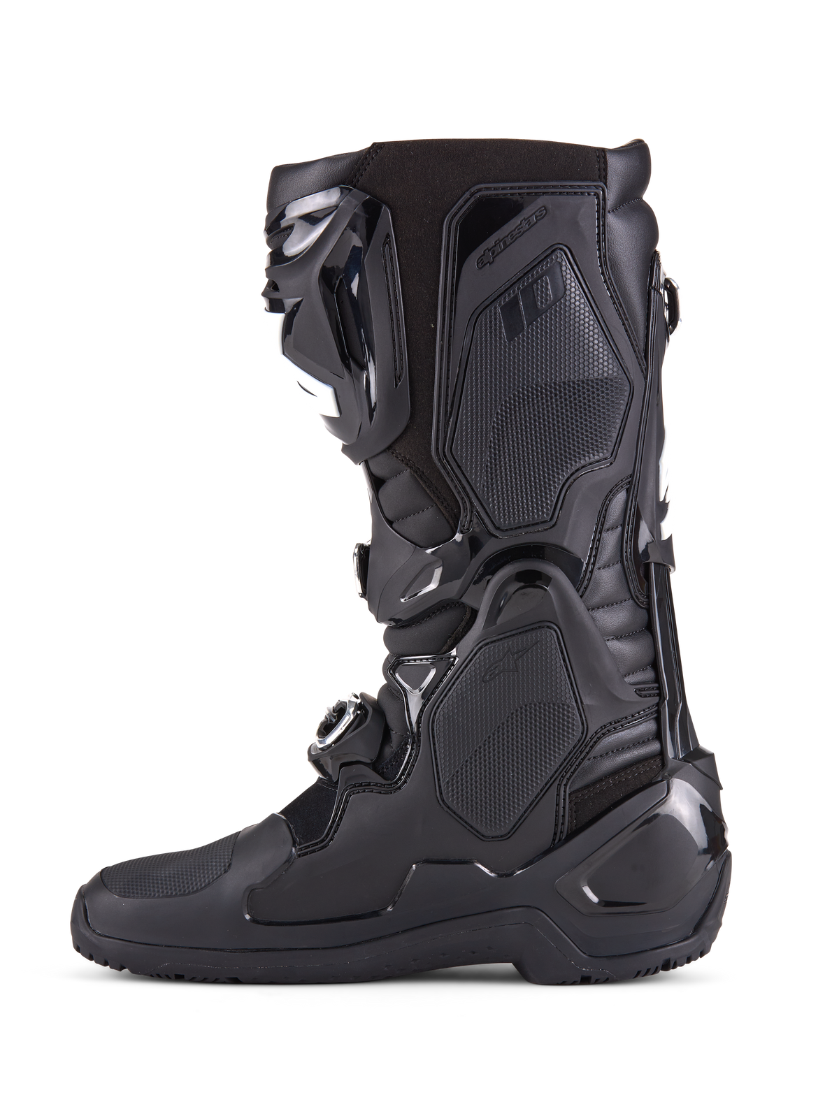 Botas Alpinestars Tech 10 Enduro, completamente negras, vista de perfil lateral de bota de motocross de alto rendimiento, con paneles protectores de TPU duraderos, sistema de cierre de triple hebilla y control de flexión avanzado para carreras off-road