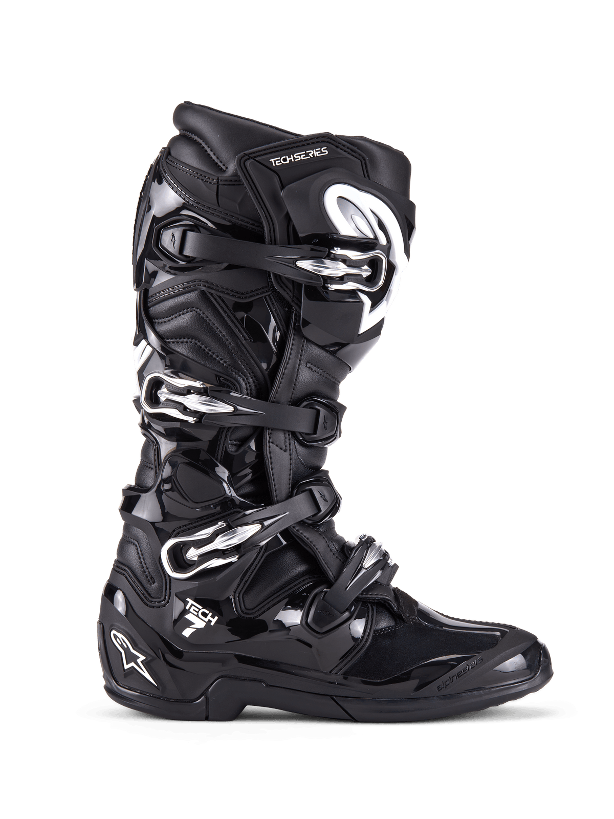 Botas Alpinestars Tech 7, botas de motocross y off-road, negras con hebillas plateadas y detalles blancos, vista de perfil lateral con cuatro hebillas de aluminio de liberación rápida, carcasa de TPU duradera y paneles texturizados para protección off-road