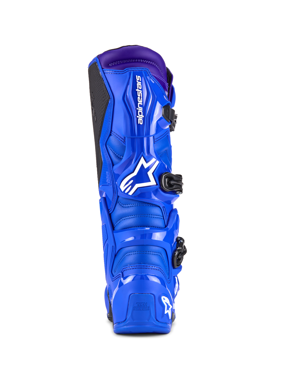 Botas Alpinestars Tech 7, botas de motocross, azul con detalles en púrpura, vista trasera que muestra la protección de TPU, logotipo blanco de Alpinestars en el talón y panel de agarre lateral negro, calzado de alto rendimiento para off-road