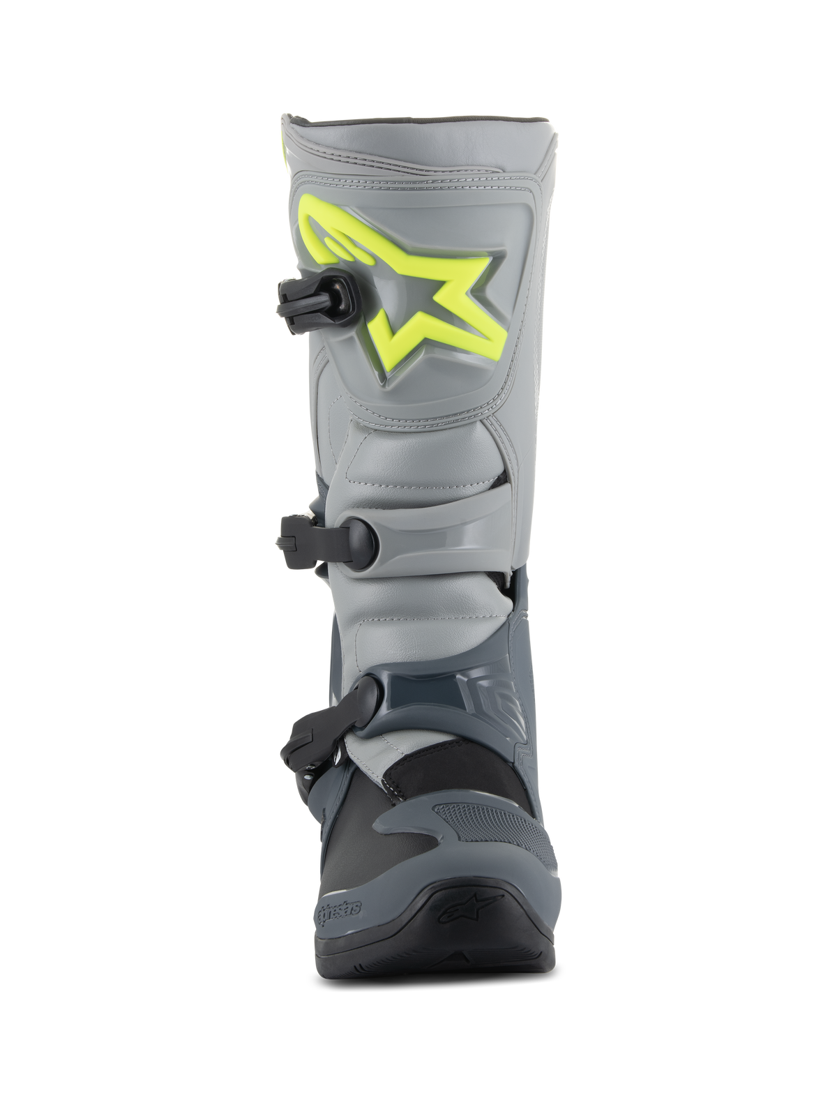 Botas Alpinestars Tech 3, botas de motocross, gris oscuro, gris claro y negro, vista frontal con un logotipo amarillo brillante en la espinillera, tres hebillas de polímero negras y una carcasa de TPU duradera para carreras todoterreno