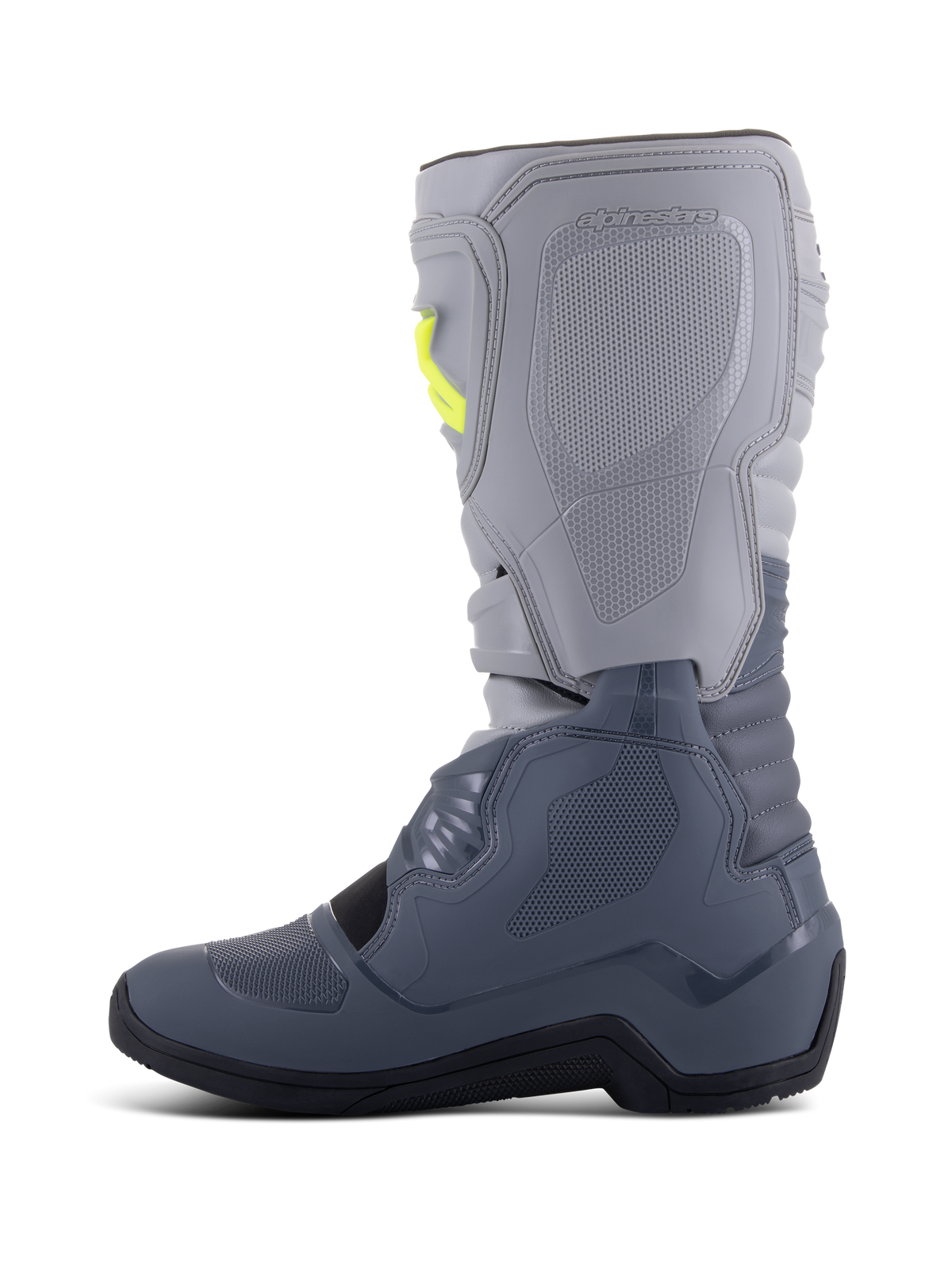 Botas Alpinestars Tech 3, botas de motocross, gris oscuro, gris claro y negro, vista lateral con la parte superior en gris claro y la parte inferior en gris oscuro, detalles de hebillas amarillas, placas de protección de TPU y suela negra duradera.