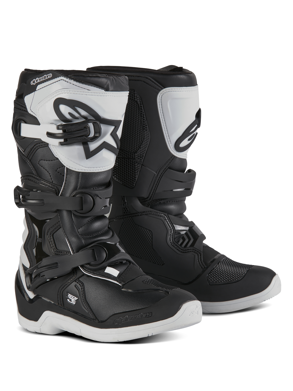 Botas Alpinestars Youth Tech 3S, botas de motocross para jóvenes pilotos, negras y blancas, con tres correas de hebilla ajustables, espinillera de TPU blanca con el logotipo de Alpinestars, protección de carcasa rígida reforzada y suela blanca resistente con dibujo, diseño de competición off-road