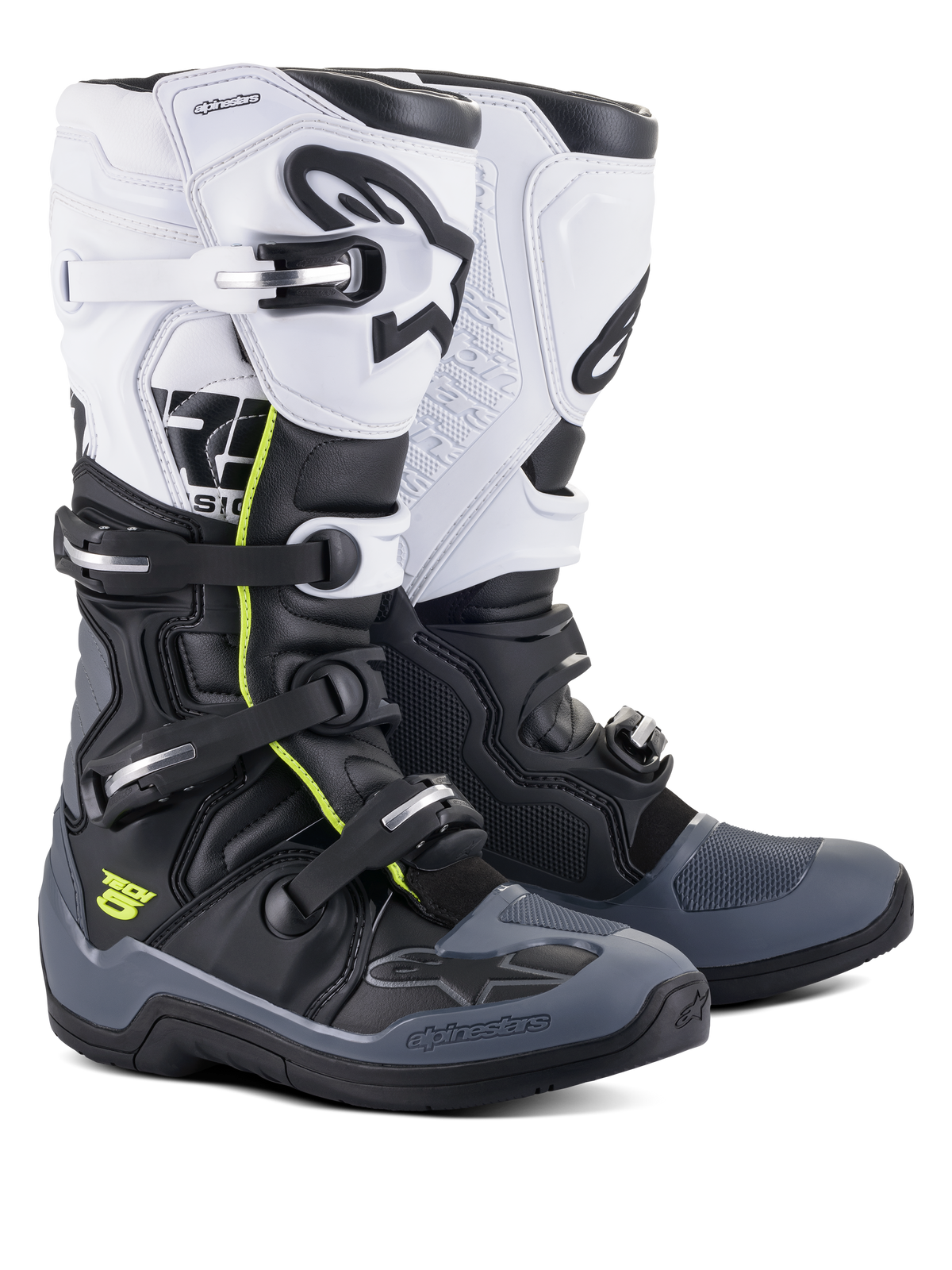 Botas Alpinestars Tech 5, botas de motocross y off-road, negro, gris oscuro y blanco con detalles en amarillo neón, sistema de cierre de cuatro hebillas, panel superior blanco con logo Astars negro, protección de puntera y talón gris oscuro y construcción de microfibra duradera