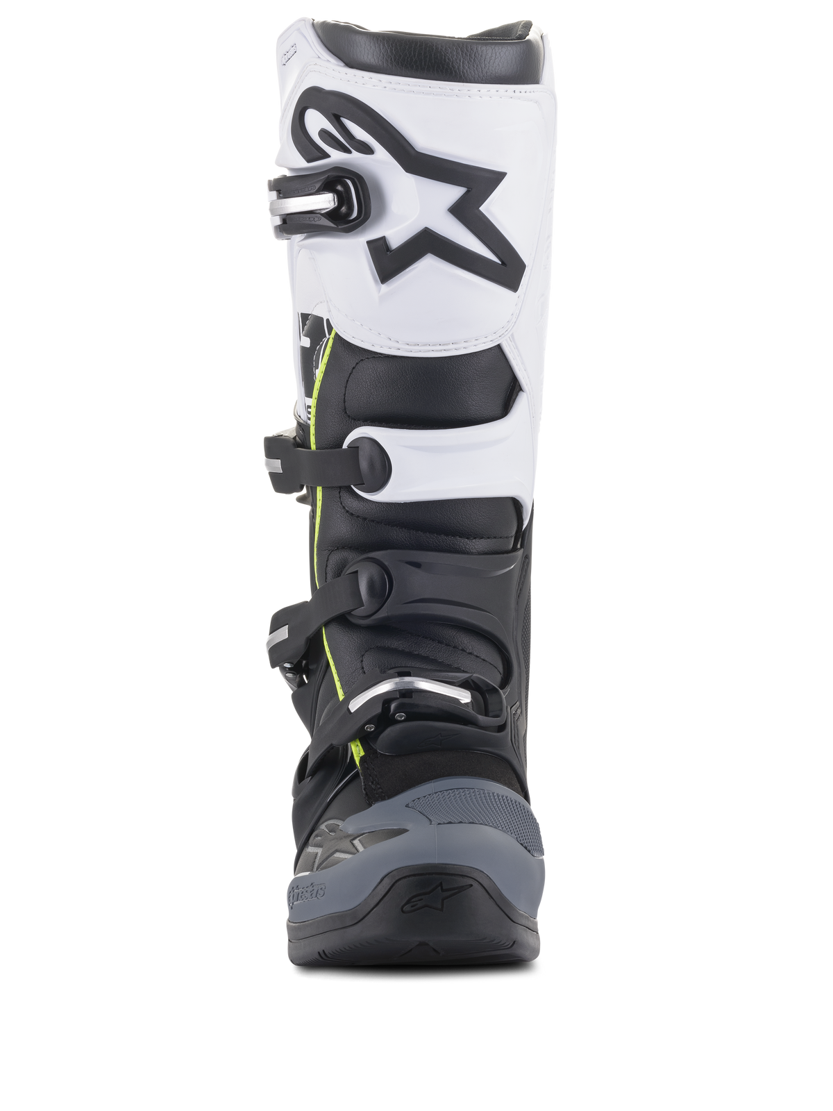 Botas Alpinestars Tech 5, botas de motocross, negro, gris oscuro y blanco, vista frontal con sistema de cierre de múltiples hebillas, panel superior blanco con logotipo de Astars en negro, puntera reforzada en gris oscuro y sutiles detalles en amarillo