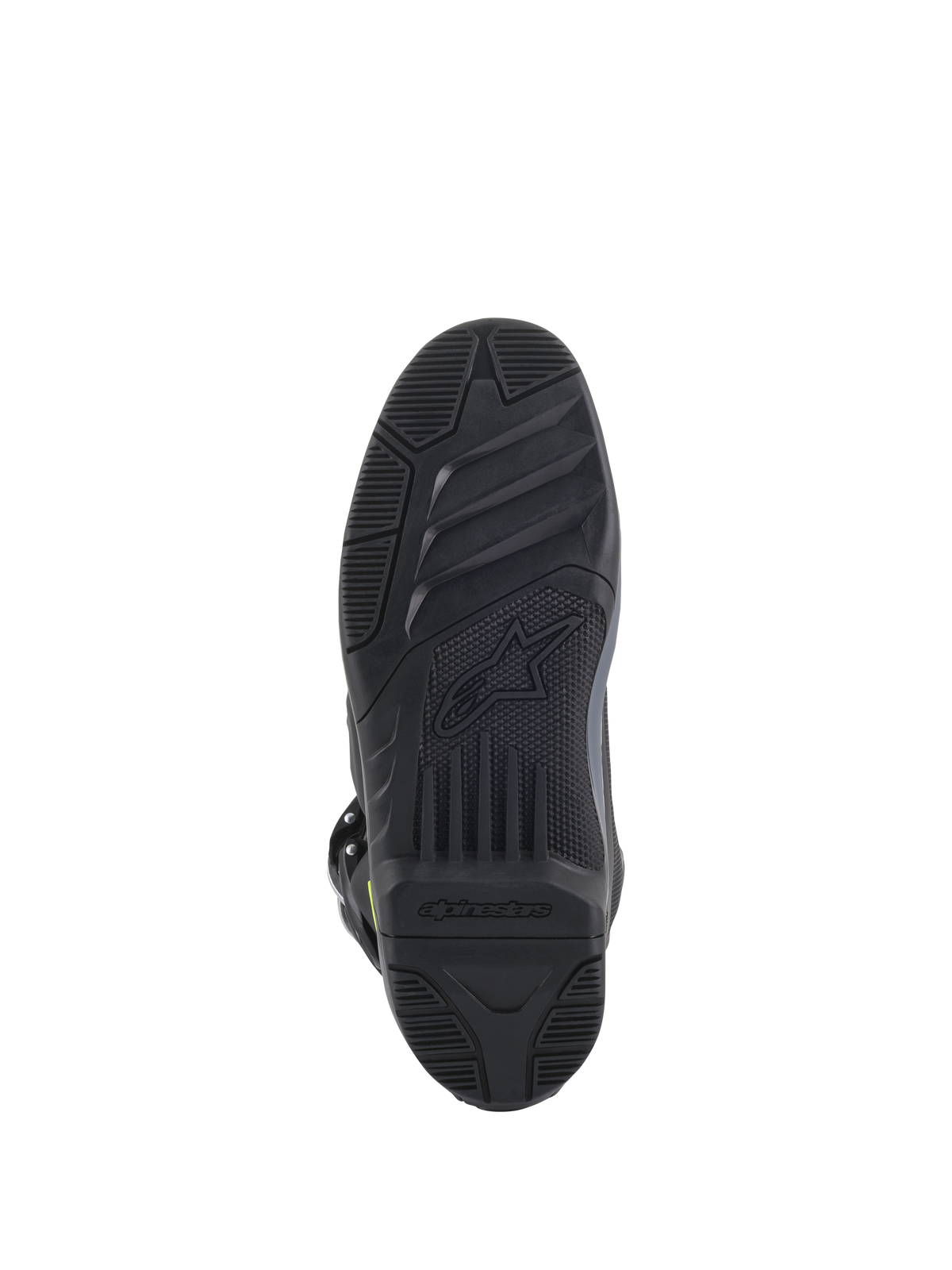 Botas Alpinestars Tech 5, vista de la suela, color negro, patrón de dibujo con textura detallada para agarre off-road, con el logotipo de Alpinestars y el símbolo de la estrella en relieve, construcción de calzado de motocross duradera