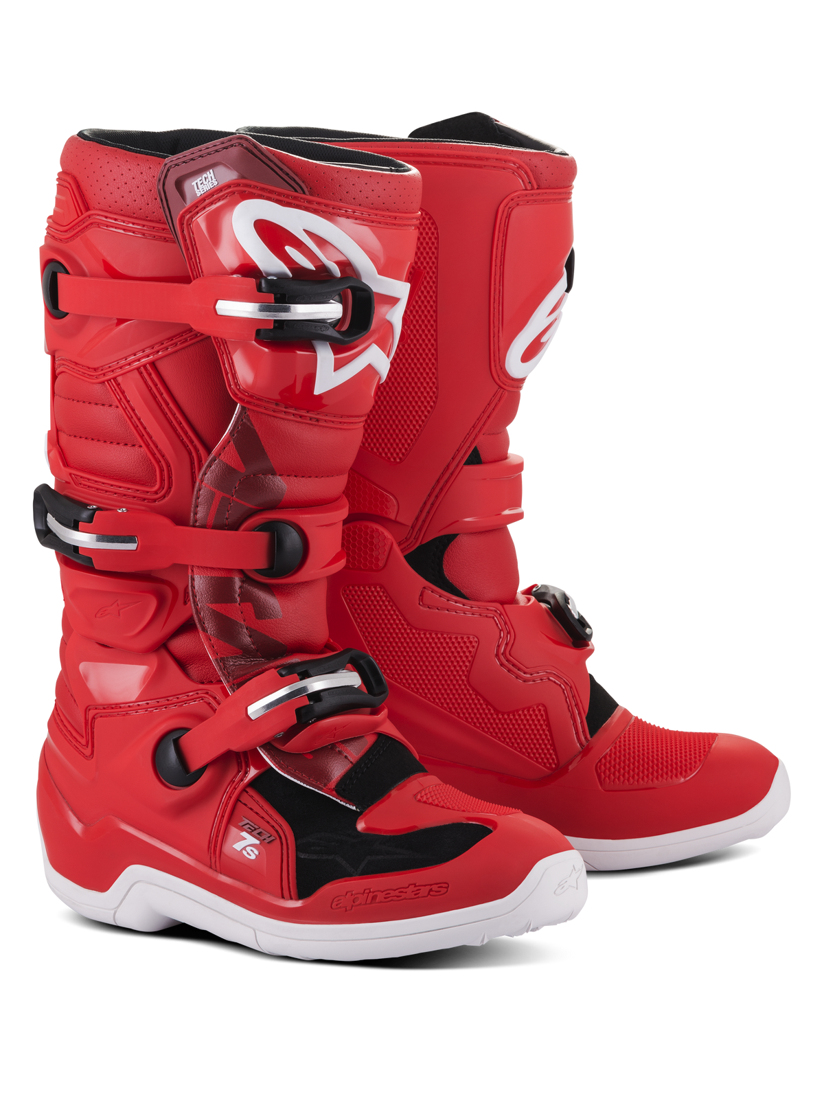 Botas Alpinestars Youth Tech 7S, botas de motocross rojas con detalles en blanco y negro para jóvenes, con un sistema de cierre de tres hebillas, logotipo blanco de Alpinestars en la espinilla y suela blanca resistente