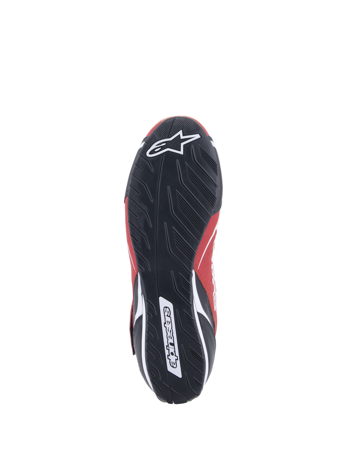 Zapatos Alpinestars Tech-1 T V3 FIA, calzado de automovilismo, rojo, negro y blanco, vista inferior de la suela de goma negra con un patrón de dibujo de neumático asimétrico y logotipo de Alpinestars en blanco
