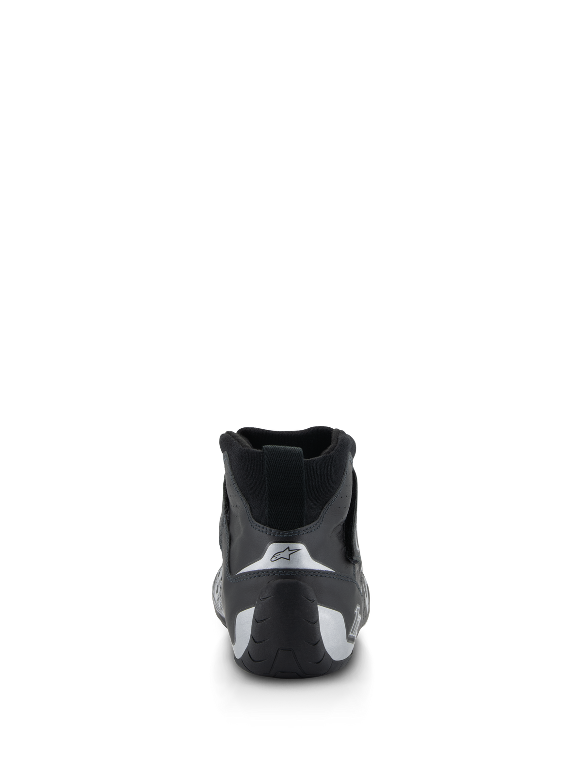 Alpinestars Tech-1 Z V3 Shoes FIA, zapatos de automovilismo, negro y plata, vista trasera que muestra el talón contorneado con detalles plateados y logo de la estrella, calzado profesional para deportes de motor