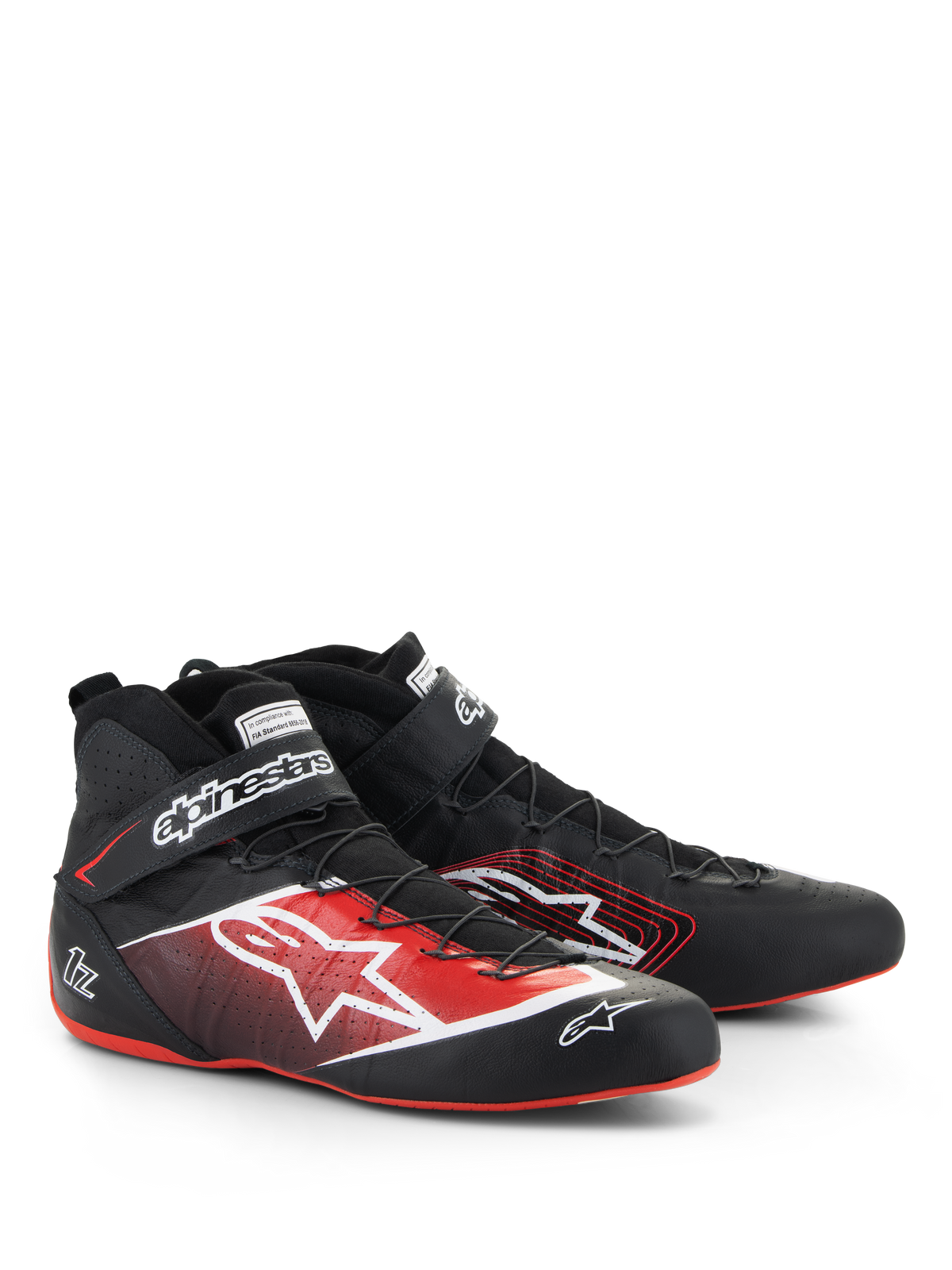 Alpinestars Tech-1 Z V3 Shoes FIA, zapatos de automovilismo, negros con detalles en rojo y blanco, con un gran logotipo de estrella blanca en el lateral, suelas rojas finas y sistema de cordones de alambre de precisión con correa en el tobillo