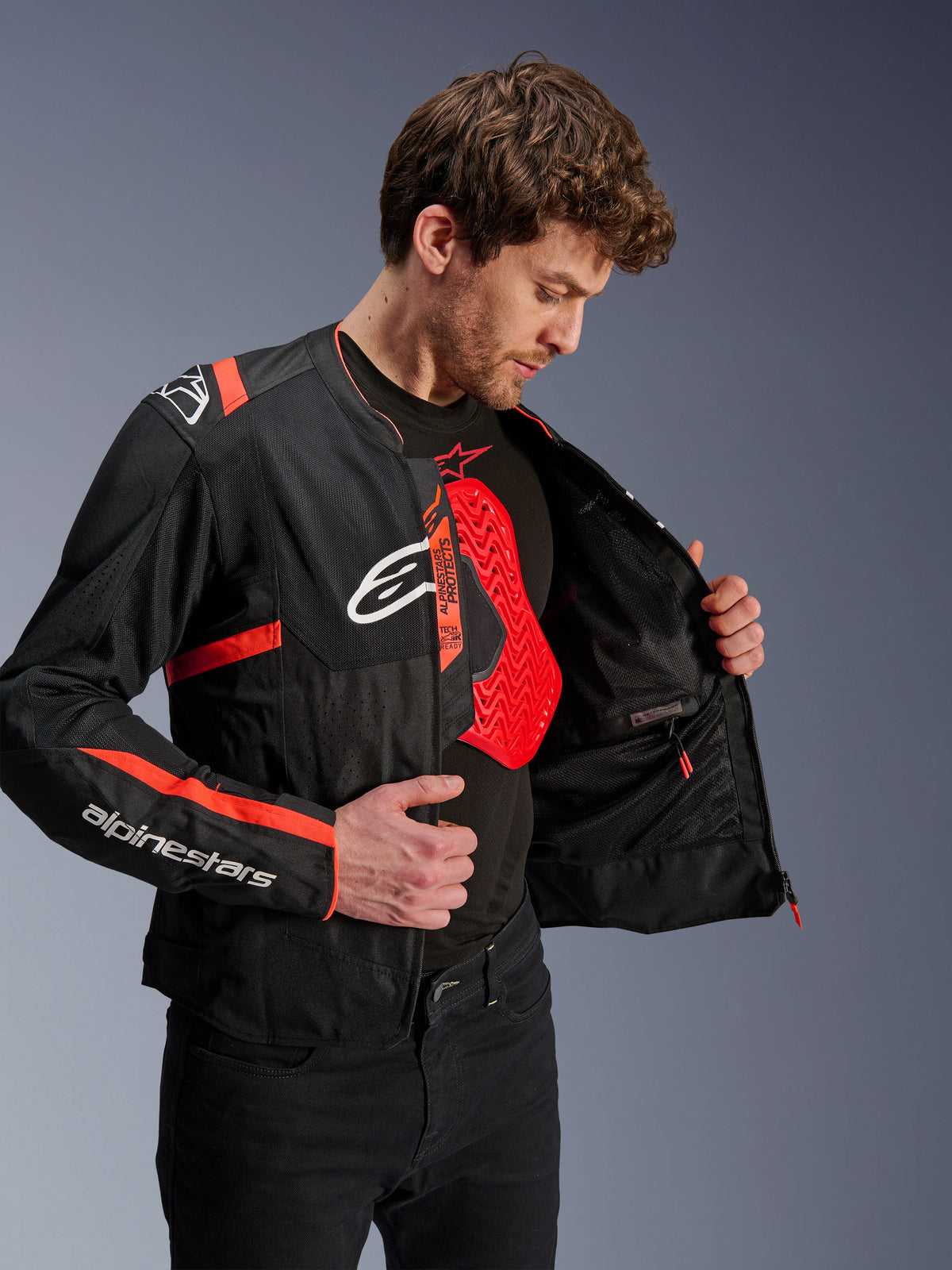 Alpinestars T-SPS Air v2, chaqueta de moto de hombre, negra y roja, con protector de pecho Nucleon y forro de malla técnica.