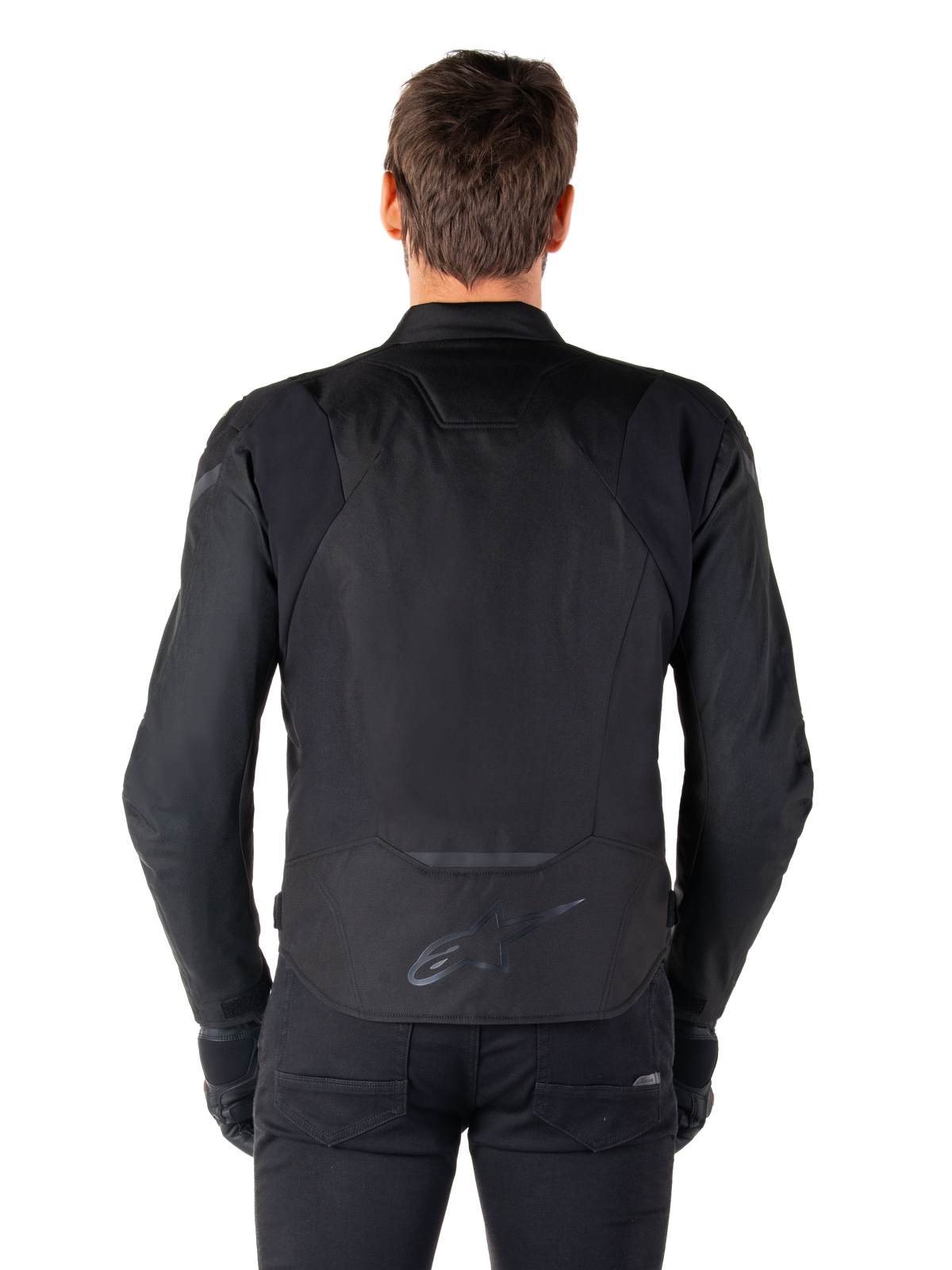 Chaqueta impermeable Alpinestars T-Jaws V4, chaqueta textil para moto, negro, vista posterior que muestra el logotipo de Alpinestars en la parte inferior de la espalda, ajuste deportivo para conducción en carretera