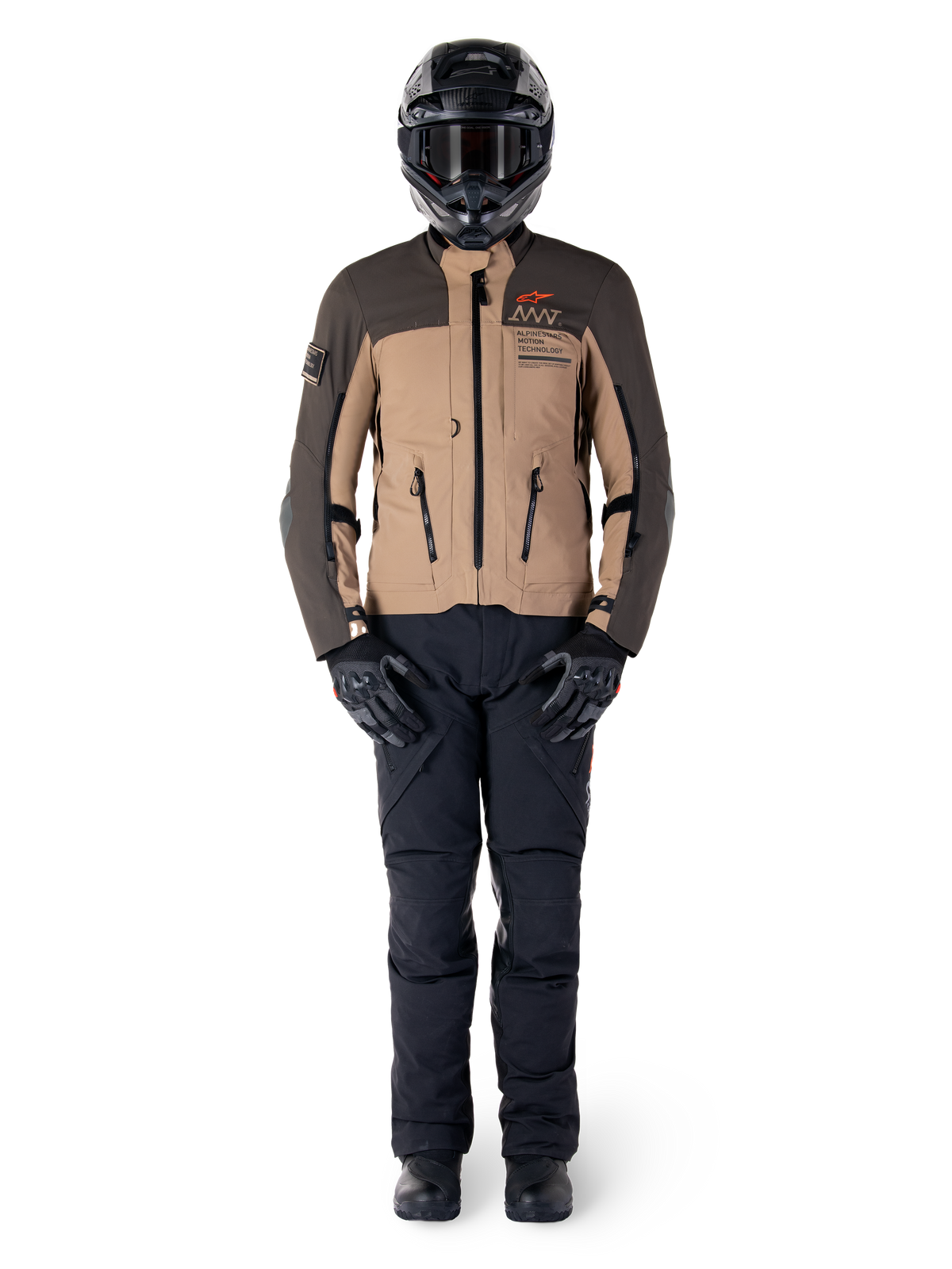 Alpinestars AMT-8 Stretch Drystar® XF Jacket, Adventure Motorcycle Jacket, Dark Brown and Dark Khaki, worn with a black helmet, goggles, black gloves, black pants, and black boots, featuring chest ventilation ports and AMT branding, coordinated gear for adventure touring