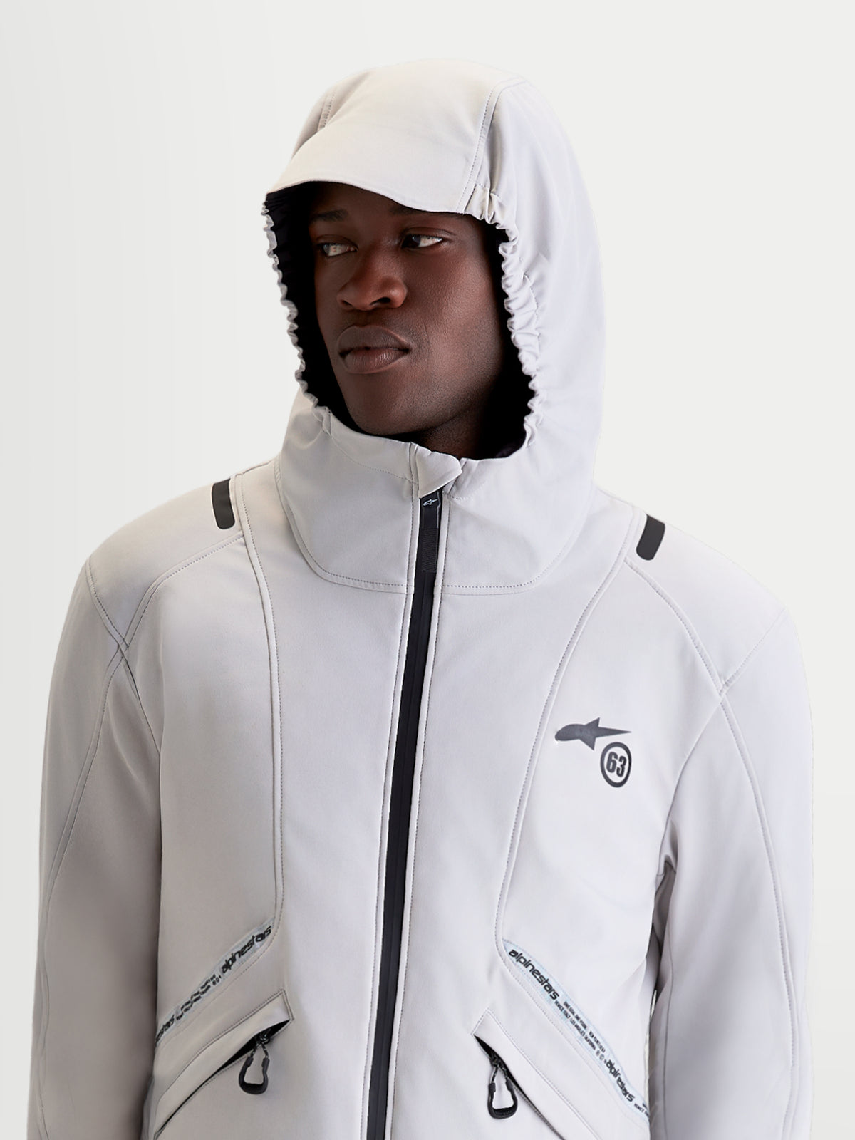 Alpinestars C-5 Drystar Jacket, men's urban contemporary motorcycle textile jacket in light gray and black, upper body view on a model wearing the jacket with its integrated hood up