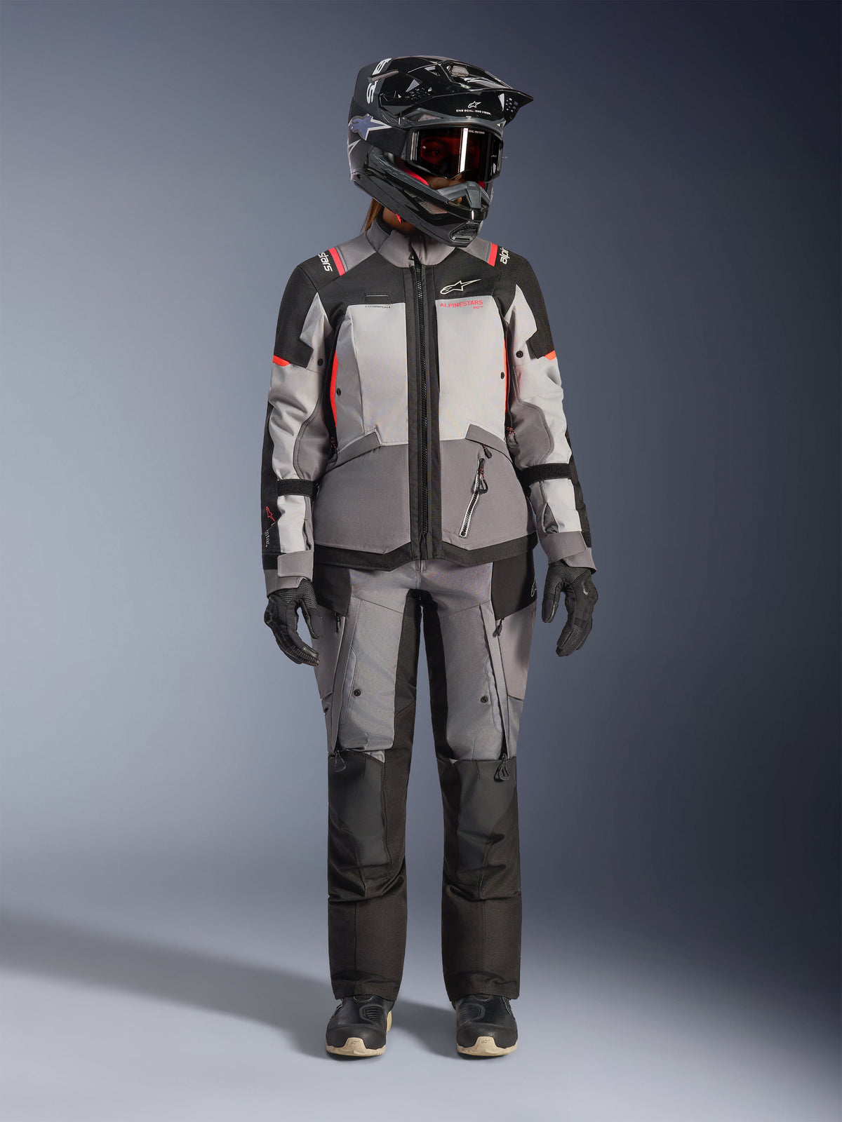 Alpinestars Stella Andes V4 Drystar® Jacket, gray and coral fluo textile women's adventure gear with matching pants.