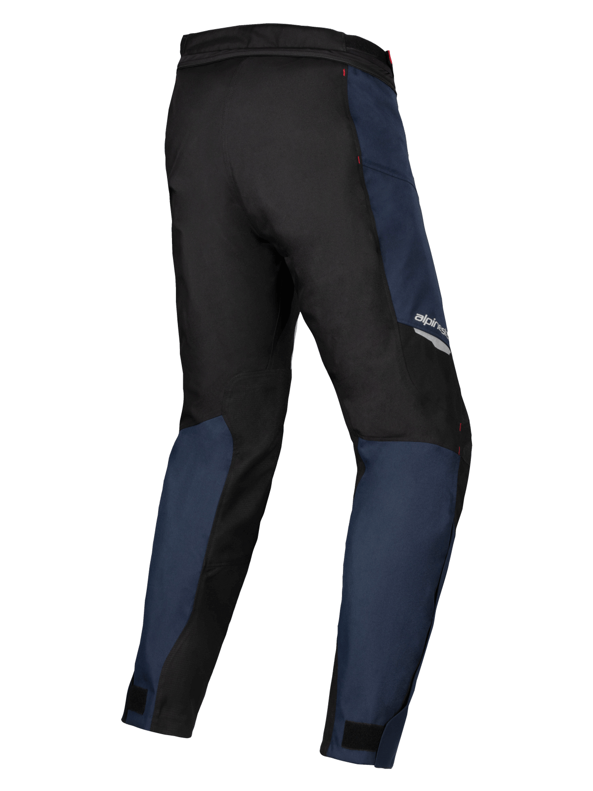 Pantalones Alpinestars Stella ST-1 Waterproof, textil azul oscuro y negro con detalles en rojo brillante, vista trasera de tres cuartos que destaca la construcción duradera y el ajuste ergonómico para turismo de aventura para mujer.