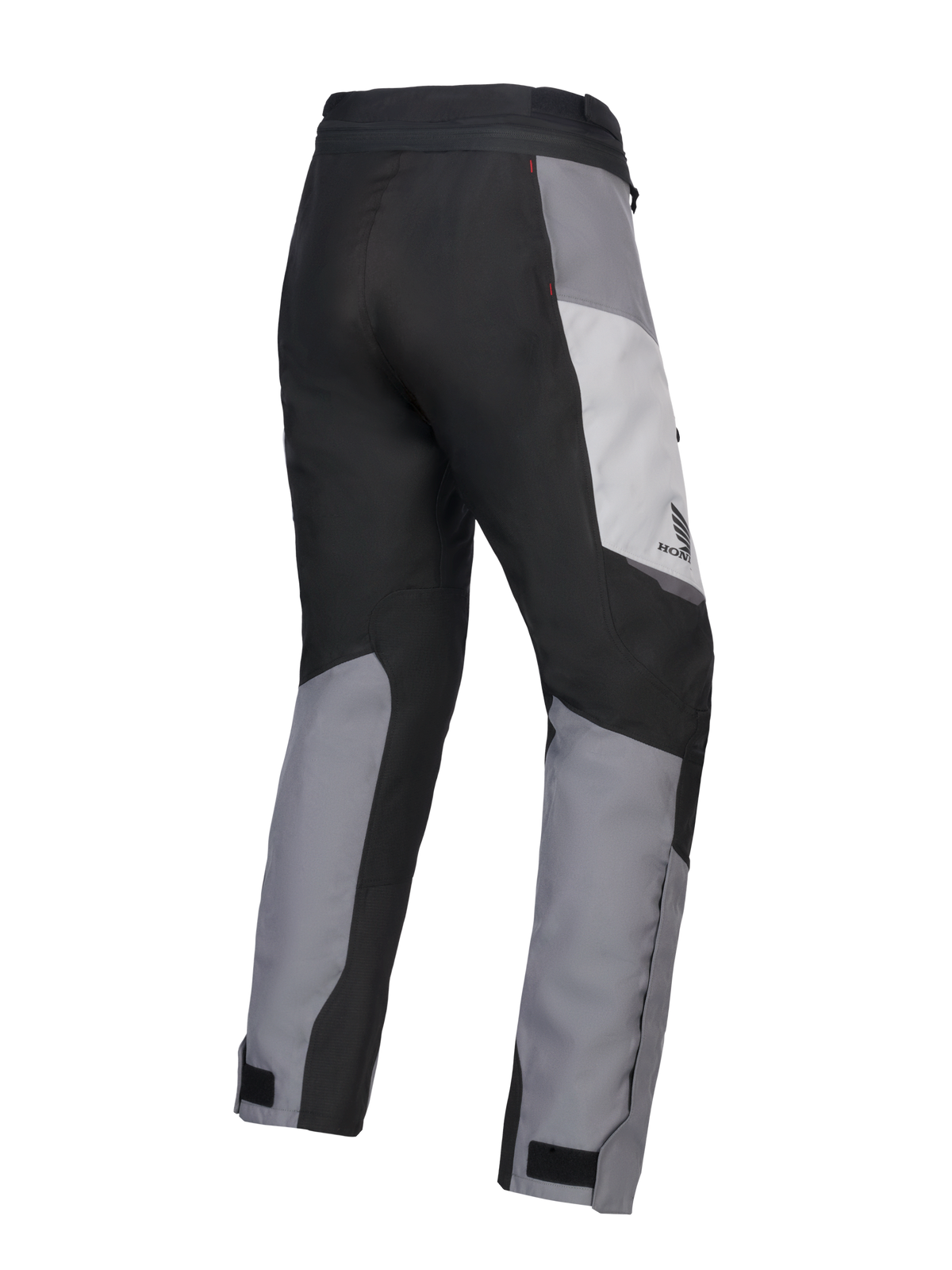 Alpinestars 2025 Honda Stella ST-1 Waterproof Pants para mujer, pantalones de motociclismo touring para mujer, gris hielo, gris oscuro y negro, vista trasera en tres cuartos que muestra la construcción textil duradera, paneles de bloques de color gris y negro, marca Honda en la cadera y cierres ajustables en los tobillos.
