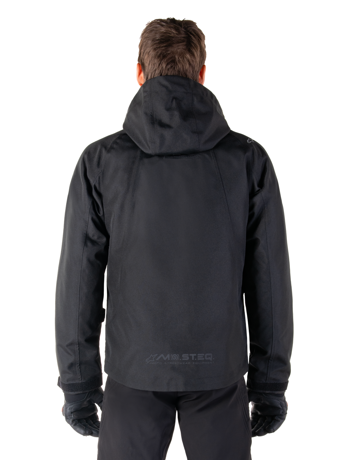Alpinestars Parka Impermeable Morush, chaqueta de moto negra para hombre, vista trasera con capucha y logo MO.ST.EQ.