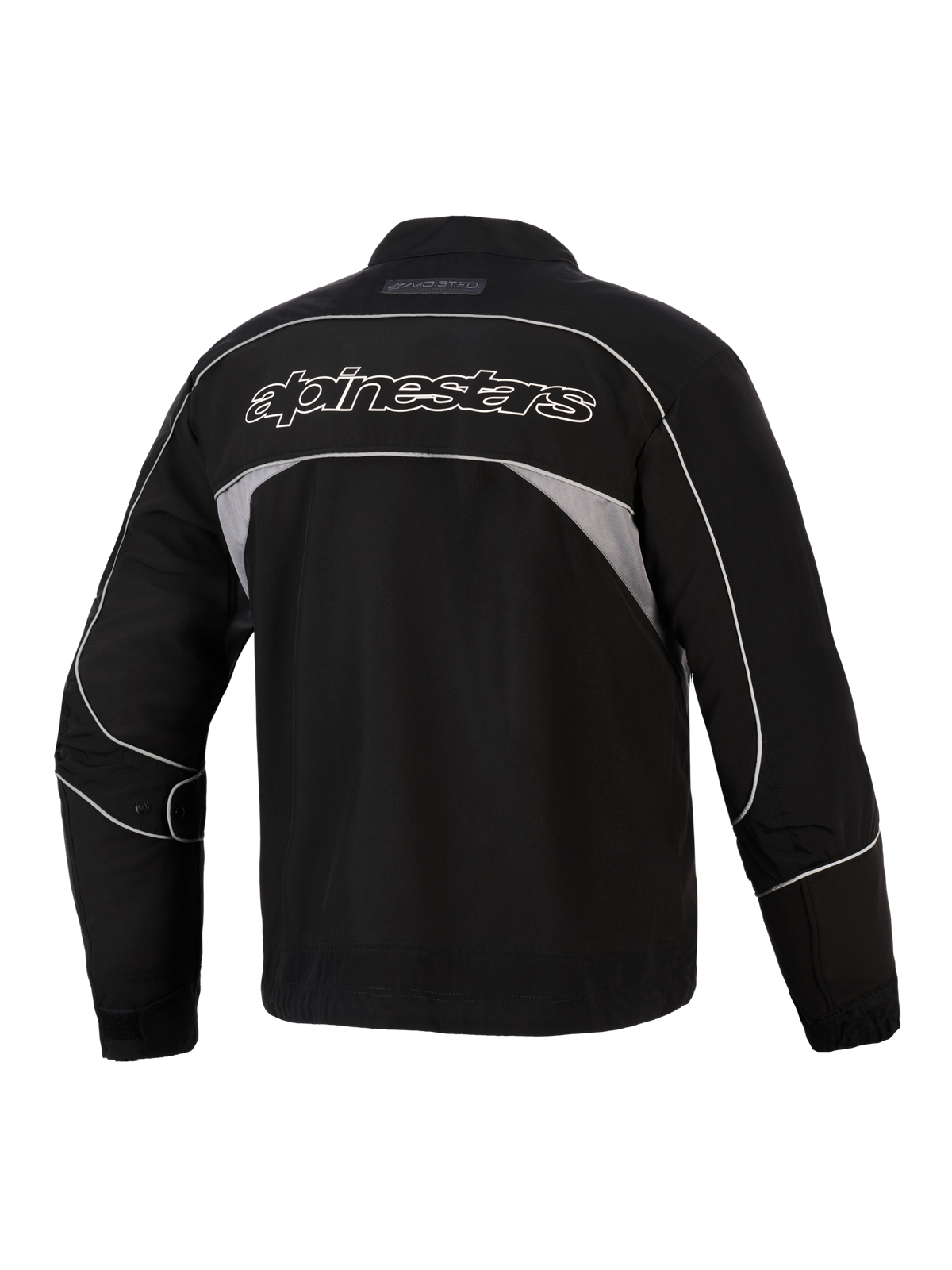 Chaqueta Alpinestars Unite, vista trasera, negra con paneles reflectantes en gris oscuro, logotipo de Alpinestars con contorno blanco en la espalda, chaqueta softshell de moto urbana con diseño minimalista