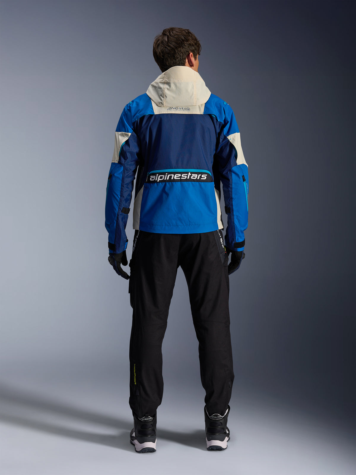 Alpinestars Mogress Air, chaqueta de moto de hombre, azul y blanco roto, vista trasera con capucha y ripstop, certificada CE