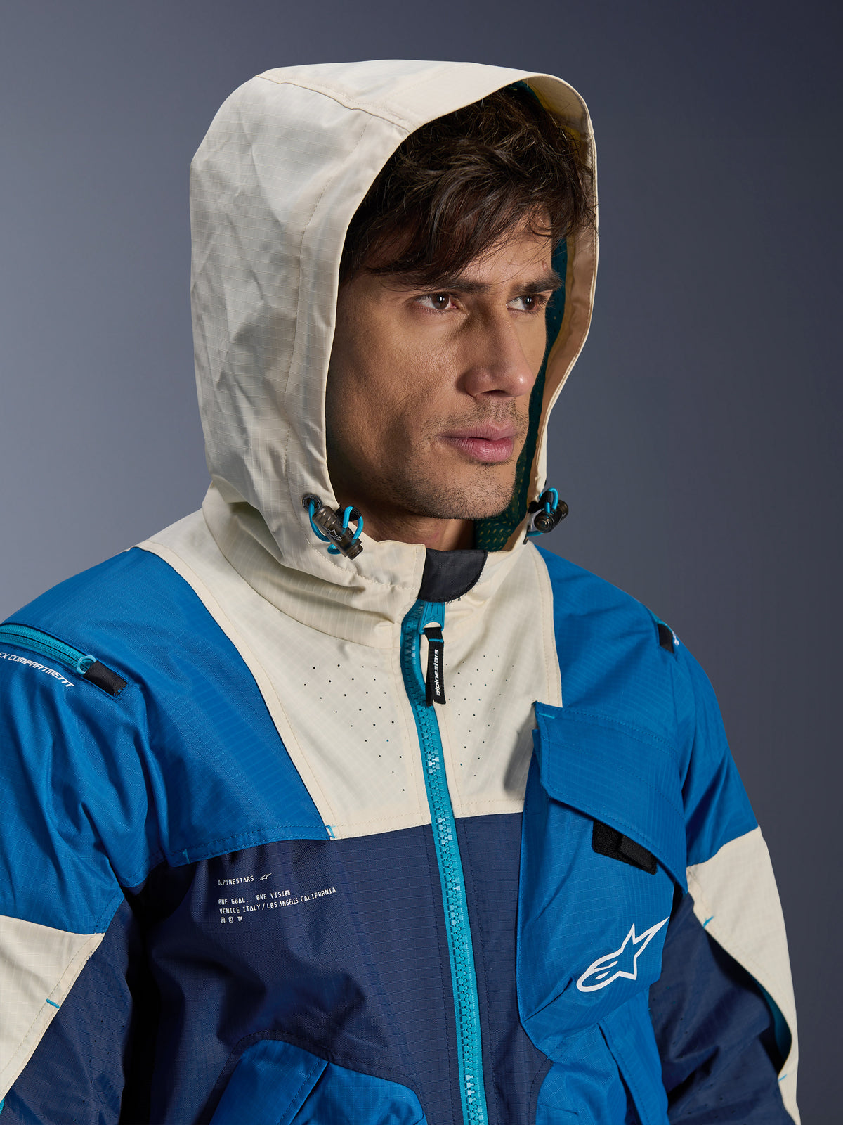 Alpinestars Mogress Air, chaqueta de moto urbana para hombre, azul y crema, textil ventilado con capucha.