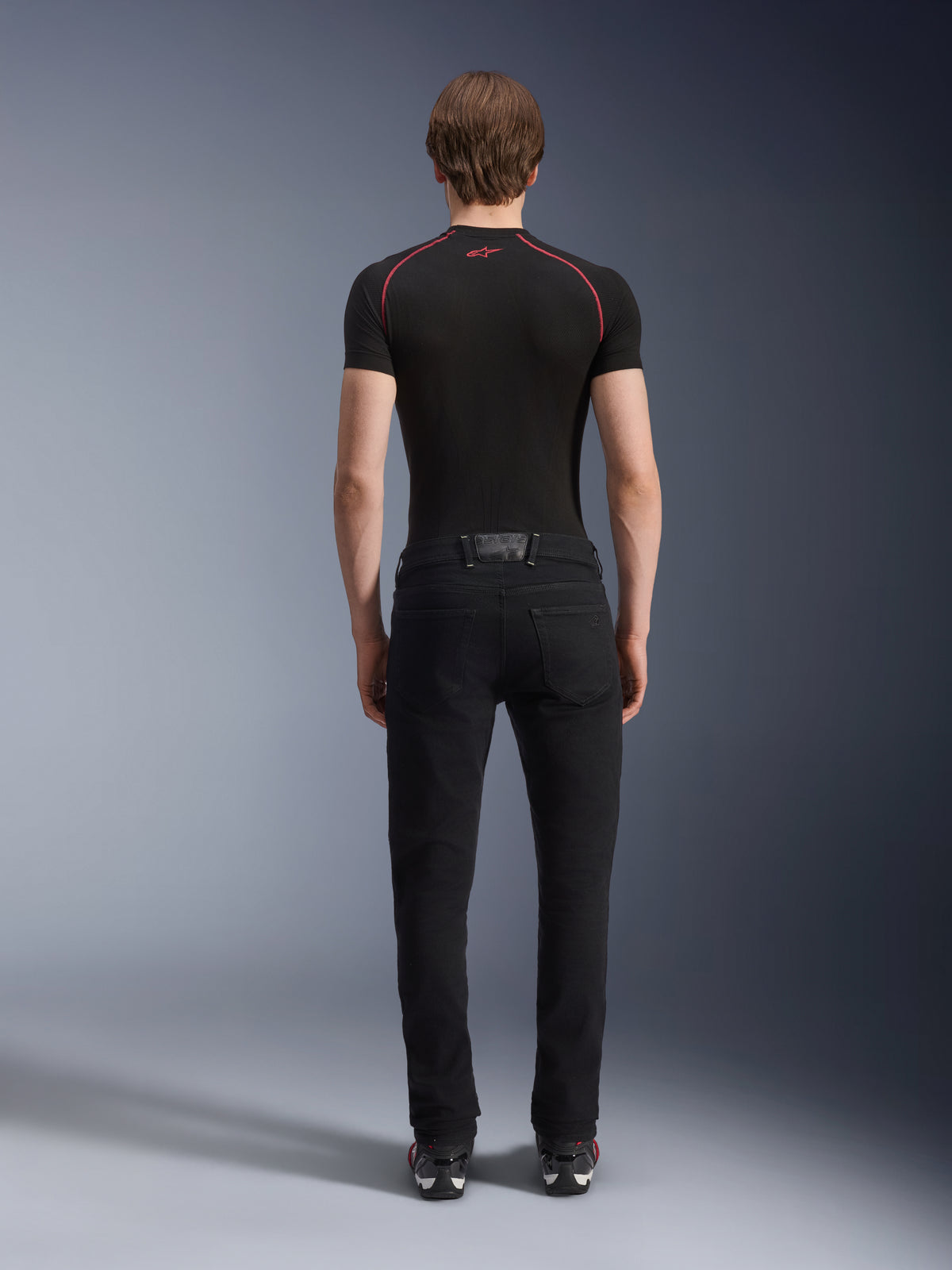 Pantalones Alpinestars Copper V3 Denim Black Rinse, vaqueros de moto de pernera recta para hombre, uso urbano, vista trasera.