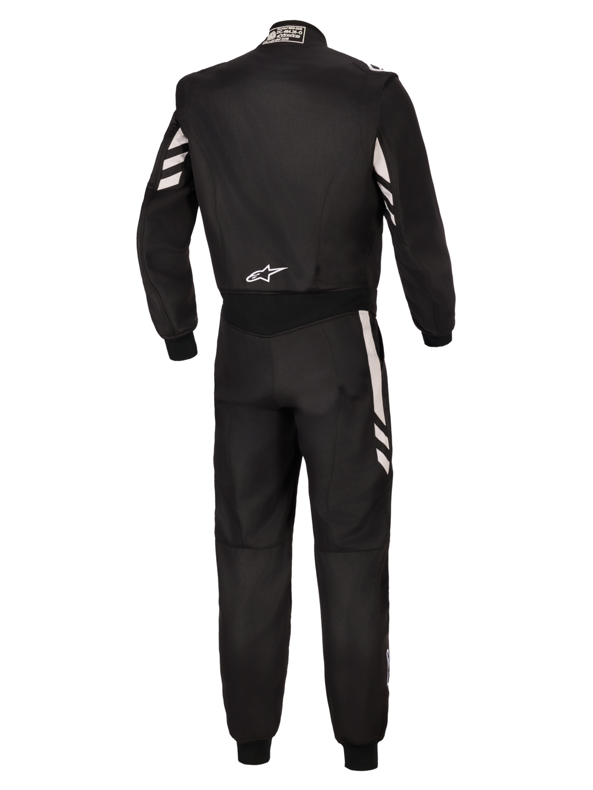 Alpinestars GP Race V3 Suit FIA, vista posterior de un mono de automovilismo de una pieza negro con detalles plateados en las mangas y piernas, con el logotipo de Alpinestars en blanco en la parte inferior de la espalda, equipamiento profesional para automovilismo con certificación FIA.
