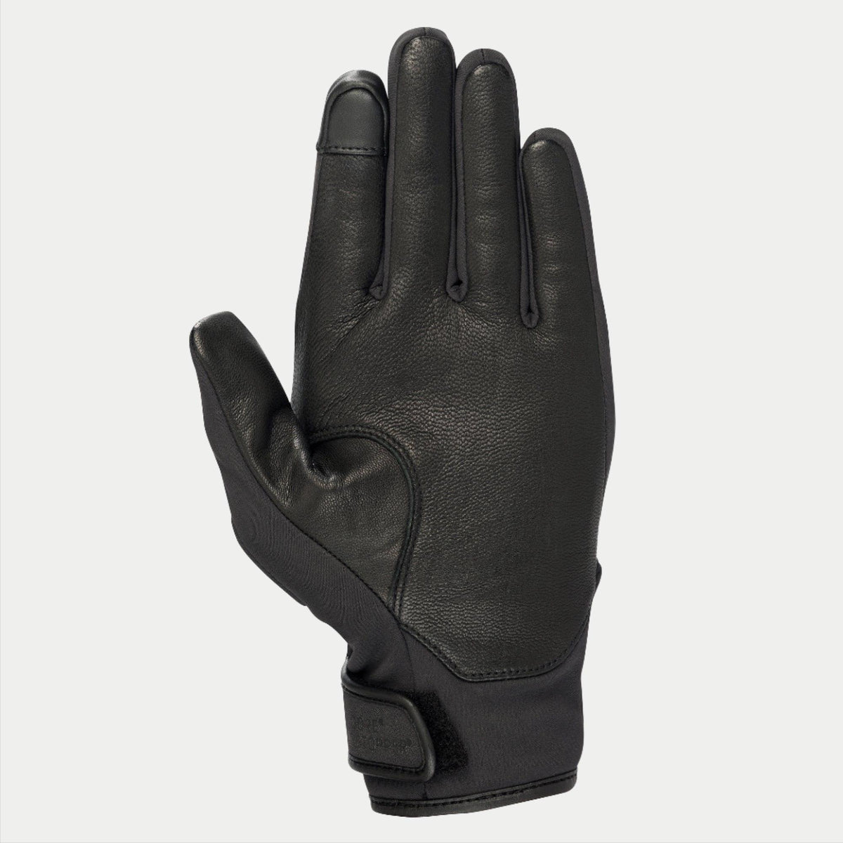 Guantes Alpinestars Stella C1 Windstopper V2 para mujer, negros, vista de la palma con refuerzos de cuero de grano completo y punta del dedo índice compatible con pantallas táctiles, cierre de puño con gancho y bucle, elegante diseño para conducción urbana