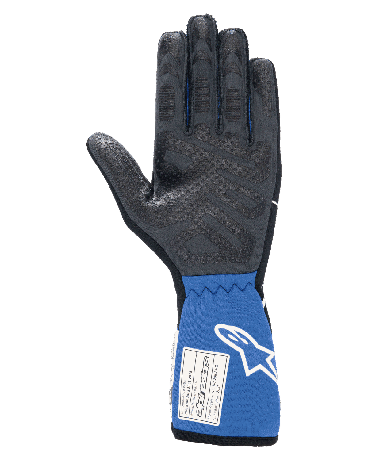 Guantes Alpinestars Tech-1 Race V4, negro y azul, vista interior de la palma que muestra el patrón de agarre de silicona texturizada, puño azul extendido con etiqueta de certificación FIA y logotipo de Alpinestars en blanco, equipamiento profesional para automovilismo