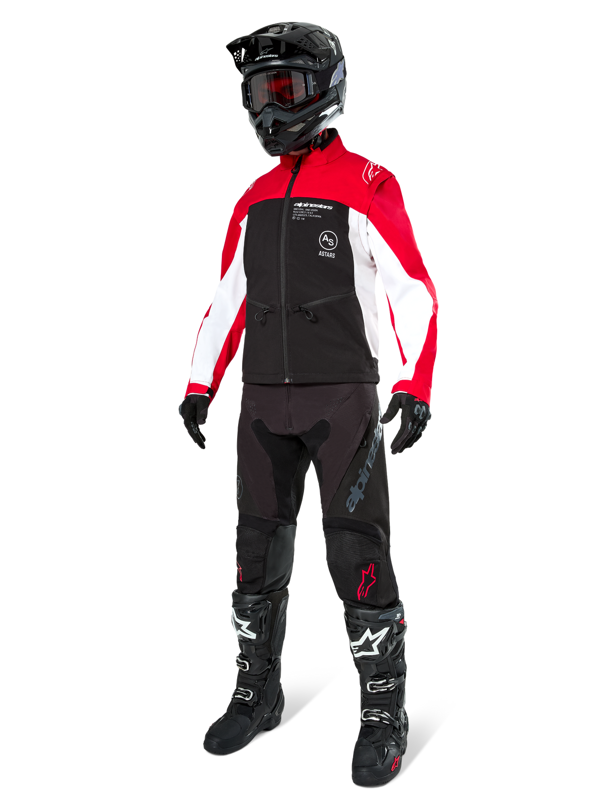 Motocross rider wearing the Alpinestars Lite-Dura Softshell Jacket in Black, Bright Red, and White, featuring a black body with red and white sleeves, paired with black pants, a black helmet with red goggles, and black and white boots, complete off-road racing outfit.