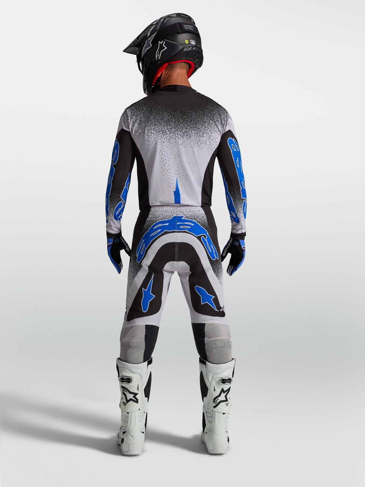 Pantalones Alpinestars Supertech Hiten AFD, equipo de motocross azul y blanco para hombre, vista trasera de ajuste atlético