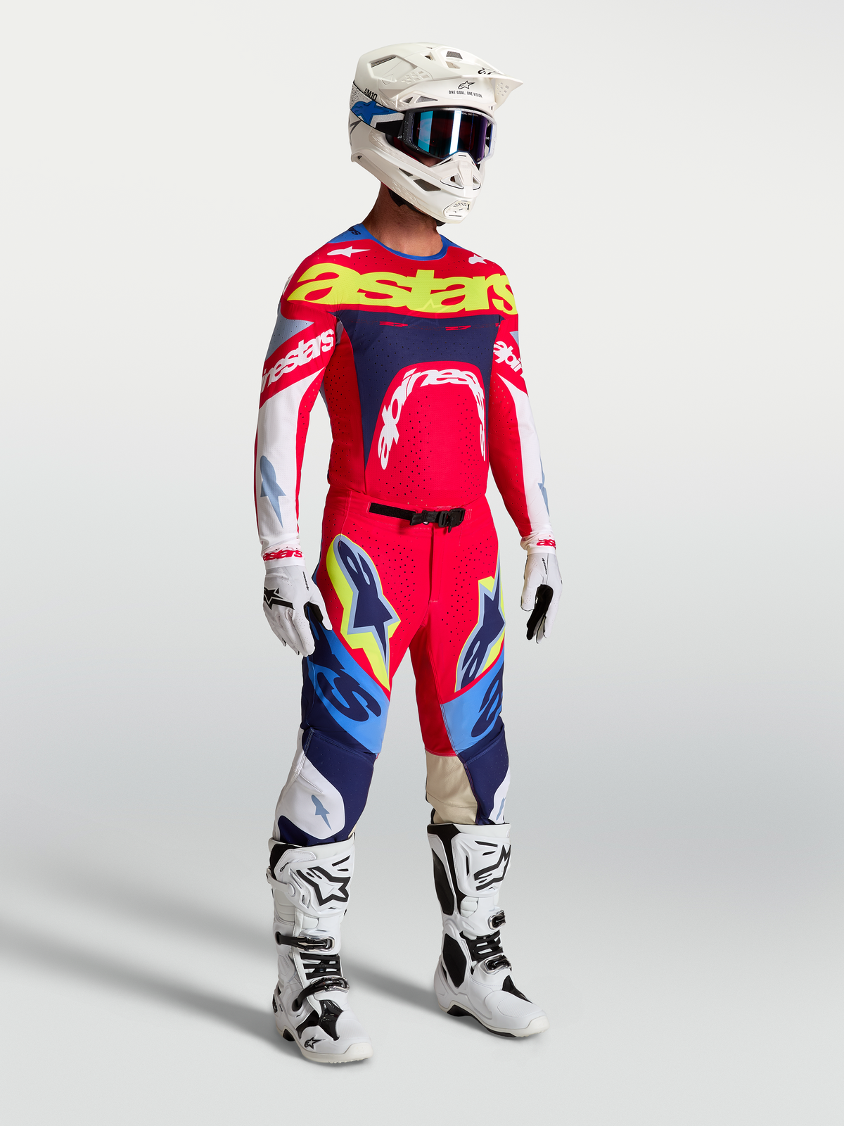 Pantalones Supertech Dyna de Alpinestars, equipo de motocross para hombre con jersey y botas blancas, rojo y azul marino.