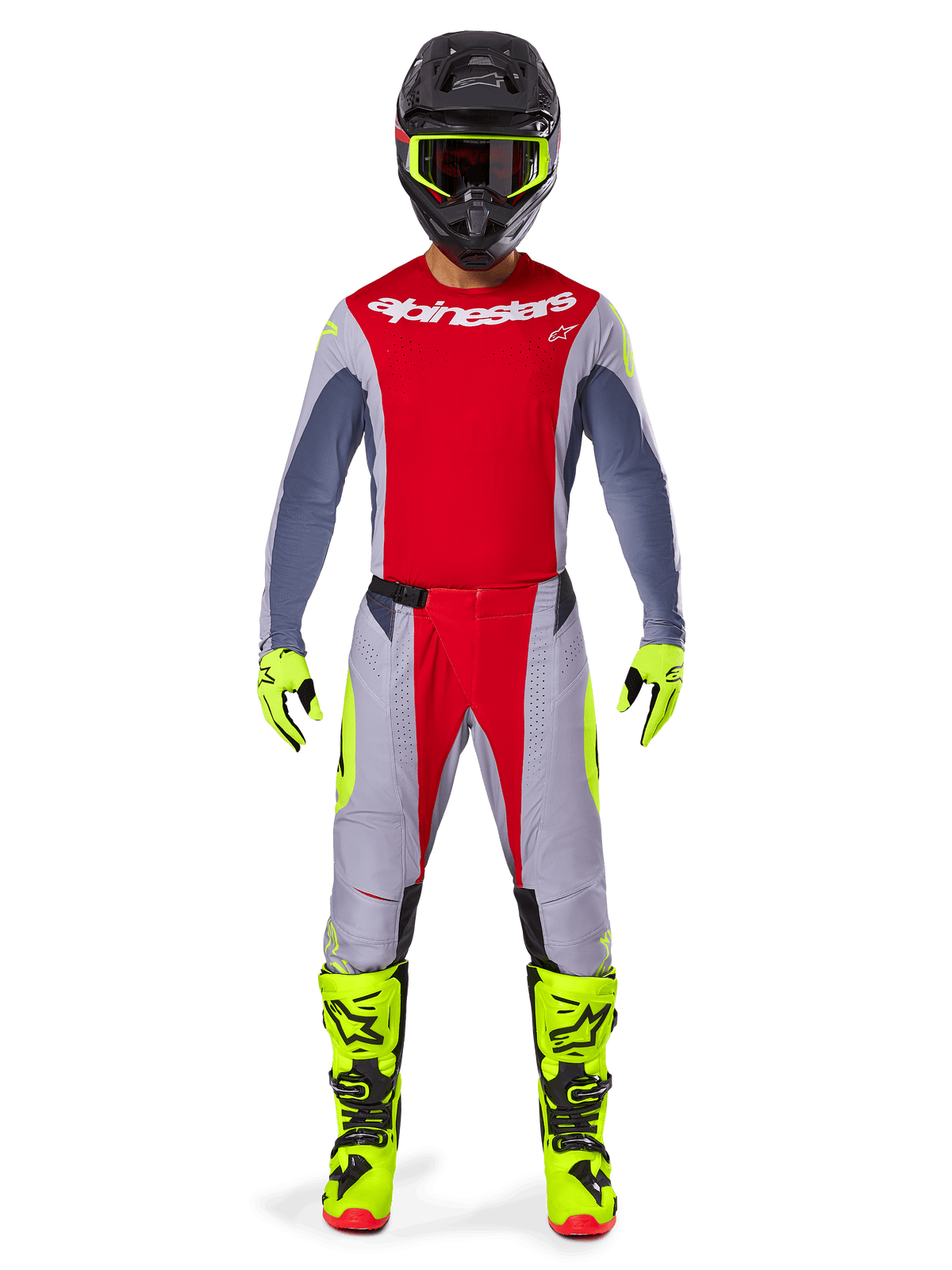 Motocross rider wearing Alpinestars 2025 Techstar Melt Pants in Bright Red and Gray, featuring vibrant red panels and fluorescent yellow accents, paired with a matching jersey, black helmet with fluorescent yellow goggles, and bright yellow boots and gloves, coordinated outfit for professional motocross racing.
