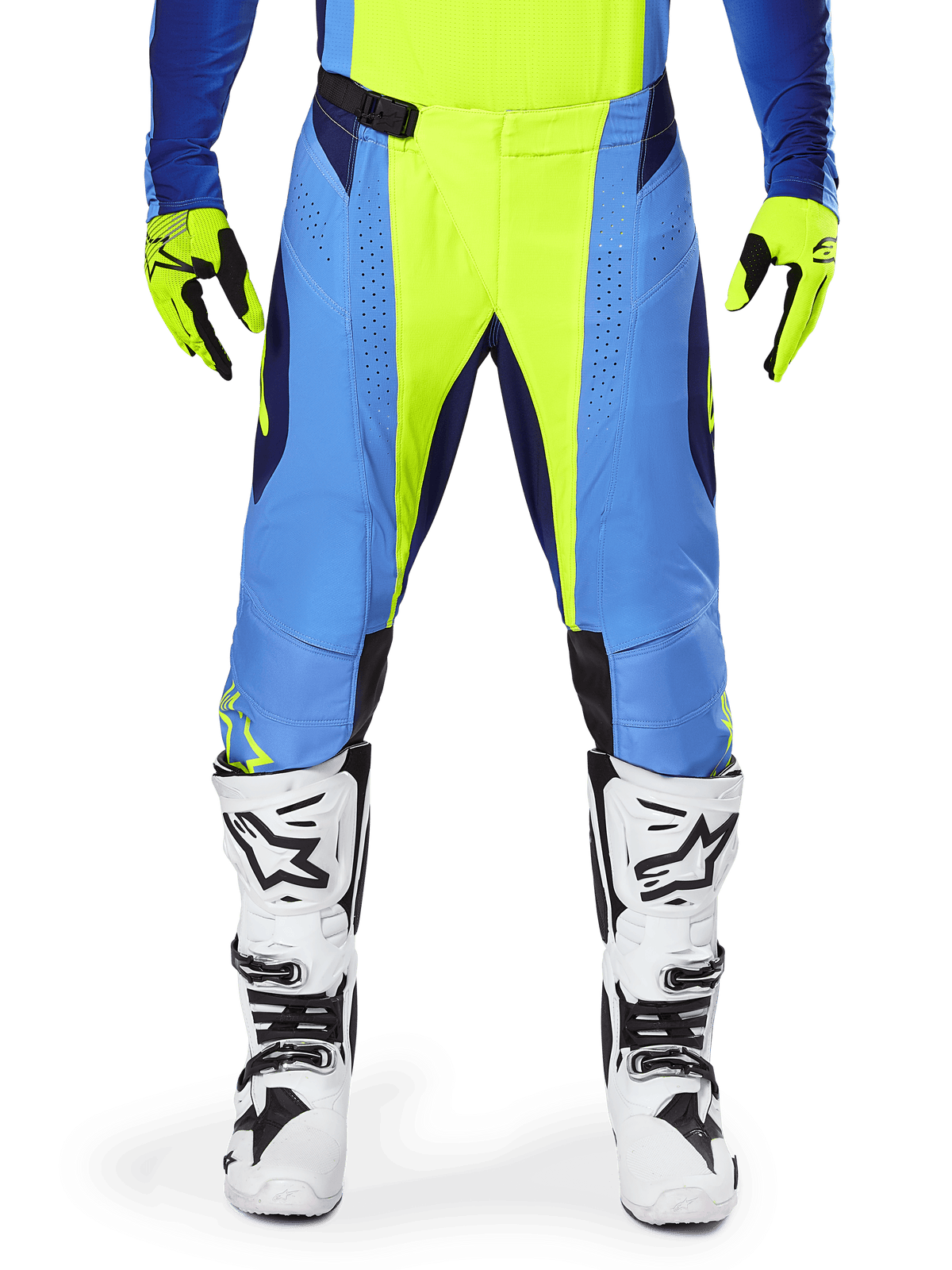 Alpinestars Techstar Melt Pants 2025, pantalones de motocross, amarillo flúor y azul, usados con guantes a juego y botas blancas, con paneles azules y detalles en amarillo flúor, diseño de alto rendimiento para carreras todoterreno