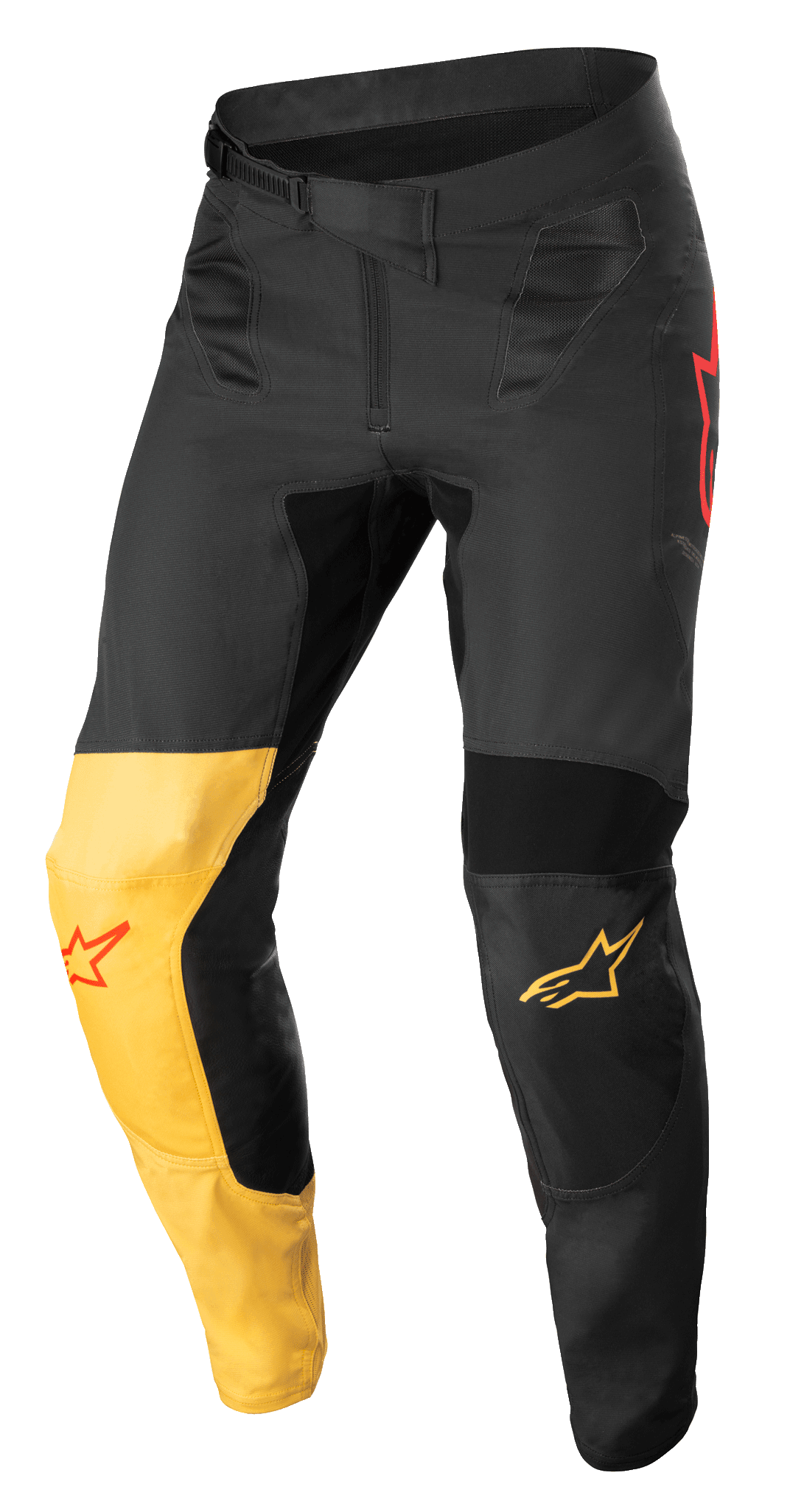 Alpinestars Supertech Blaze Pants, Motocross Pants, Black, Warm Yellow and Red Fluo, featuring a distinctive yellow knee panel, red star logo accents, secure ratchet waist closure, and reinforced protective panels for off-road performance.