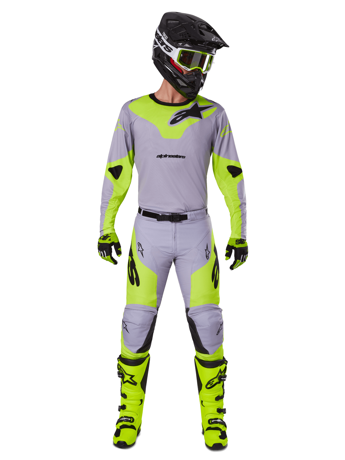 Alpinestars 2025 Racer Veil Pants, pantalones de motocross, gris y amarillo flúor, usados como un conjunto completo de equipamiento de carreras con jersey, casco, botas y guantes a juego, con logotipos negros y diseño ergonómico para rendimiento off-road