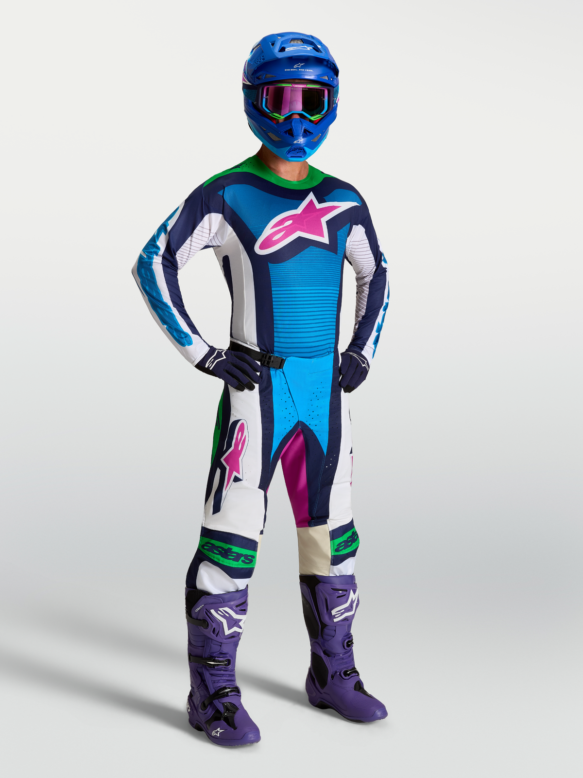 Alpinestars Techstar Maven, pantalones y conjunto de motocross para hombre, azul y blanco con detalles verde flúor.