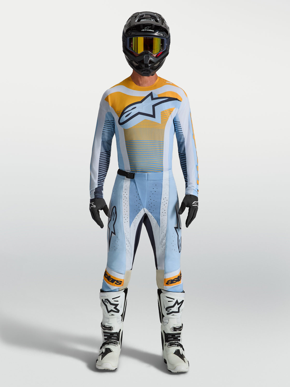 Alpinestars Techstar Maven, pantalones de motocross para hombre, azul y naranja, ajuste de carrera con zonas elásticas