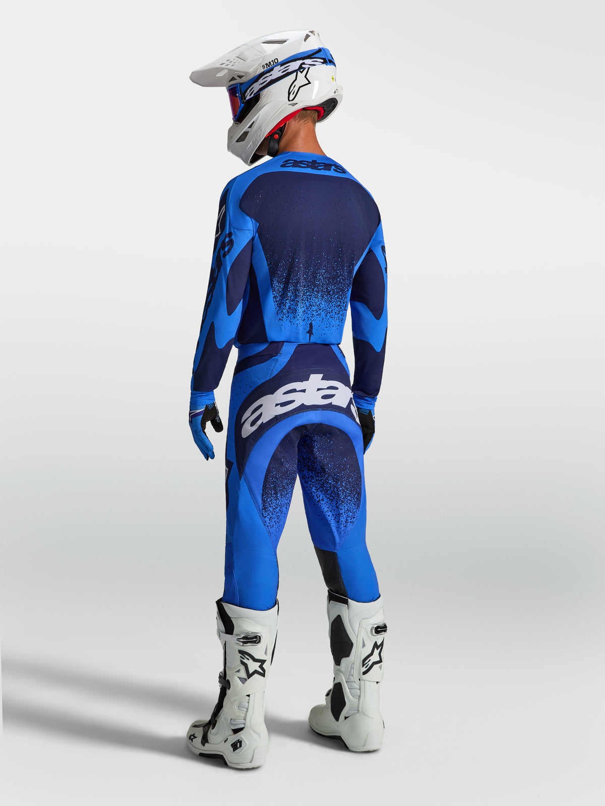 Alpinestars Techstar Swan Pants, blue and white men's motocross pants shown from the rear with a race fit.