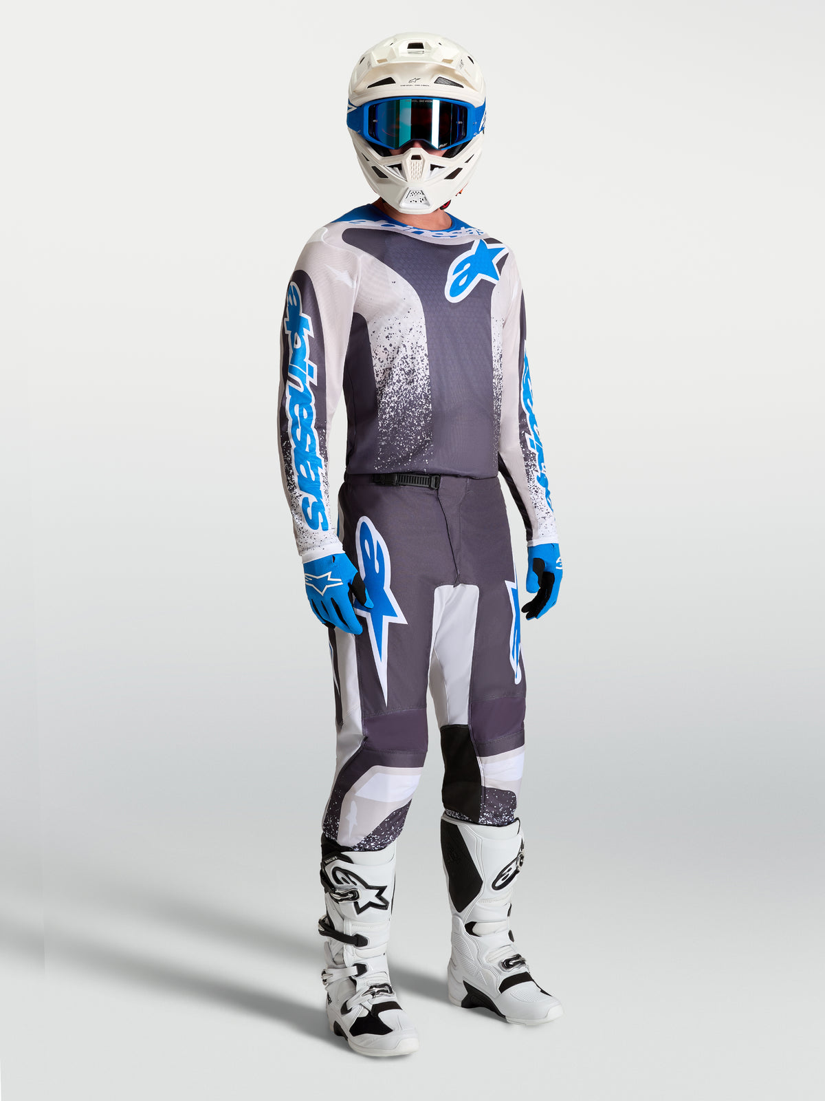 Alpinestars pantalones Fluid Drag y equipo de motocross para hombre, gris y azul, diseño ergonómico 3D para rendimiento.