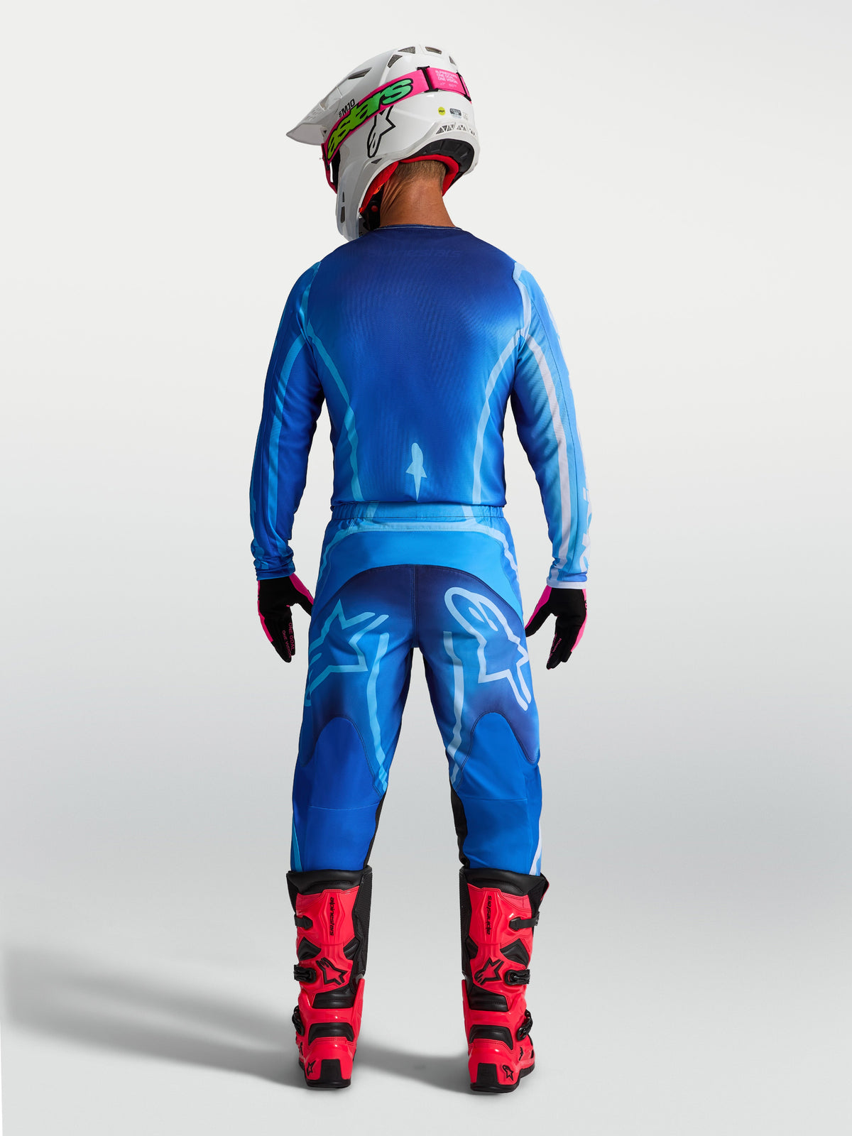 Alpinestars Fluid Kepler, pantalones de motocross para hombre en azul, vista trasera con ajuste ergonómico de politejido